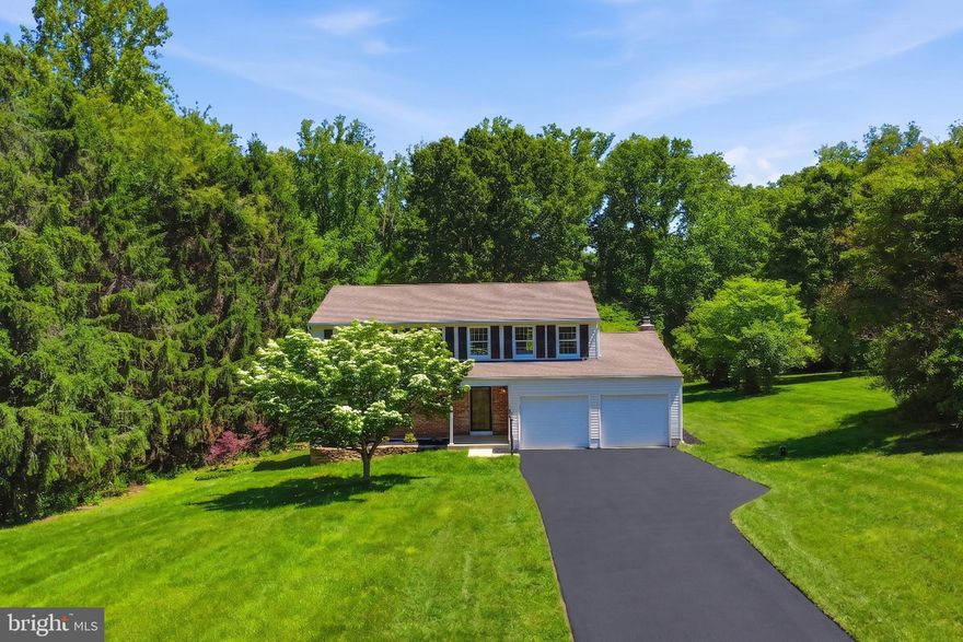 Imagine leaving the fast pace of the day behind as you turn into a quiet Marriottsville cul-de-sac, where a gentle canopy of mature trees welcomes you home. For nearly five decades, this 1978 residence has been cherished by its original owner, quietly absorbing memories while standing as a private, woodland sanctuary on almost a full acre. Though you are remarkably close to Route 70 and local shopping, the sights and sounds of the world simply fade away here, replaced by the gentle rustle of leaves and the promise of absolute serenity. Adding to the peace of mind, the property sits within the highly sought-after Marriotts Ridge High School district.

Stepping inside, the story shifts from a cherished past to effortless modern elegance. The entire home has been thoughtfully reimagined with a designer’s touch, bathed in a sophisticated palette of fresh colors and illuminated by sleek new lighting. Newly refinished hardwood floors catch the light, guiding you into a totally refreshed kitchen. Here, brand-new appliances and crisp new flooring create an inspiring space for morning coffee or elaborate evening meals. As the seasons change, the family room becomes the heart of the home, where a classic wood stove waits to provide a crackling fire on crisp autumn nights. When the weather warms, slide open the glass doors to a generous deck, your personal front-row seat to an expansive, verdant backyard that feels entirely your own.

The upper level is dedicated to rest and rejuvenation, featuring plush new carpet and four exceptionally spacious bedrooms. The daily routine is elevated by completely modernized bathrooms showcasing elegant new fixtures and finishes. The crowning achievement is the primary suite—a true personal retreat designed to emulate the ambiance of a luxury hotel. Complete with a walk-in closet and a flawlessly redesigned ensuite, it offers a spa-like daily escape.

Beyond the beautifully finished living areas, the lower level presents an exciting opportunity to expand your footprint. Offering an additional 728 square feet of unfinished space, the basement serves as a blank canvas awaiting your personal vision—whether you dream of designing a custom home gym, adding a guest bedroom and additional bath, or creating a sprawling recreation and laundry room. Lovingly maintained and perfectly updated, this home beautifully bridges the gap between a secluded, dreamy woodland retreat and a highly convenient, move-in-ready reality. This stunning property will be available for viewing soon; be sure to schedule your tour early so you don't miss the opportunity to call it yours.

MAY BE ELIGIBLE TO RECEIVE A 5.49% INTEREST RATE FOR THE FIRST YEAR AT NO ADDITIONAL COST BY USING PREFERRED LENDER.
