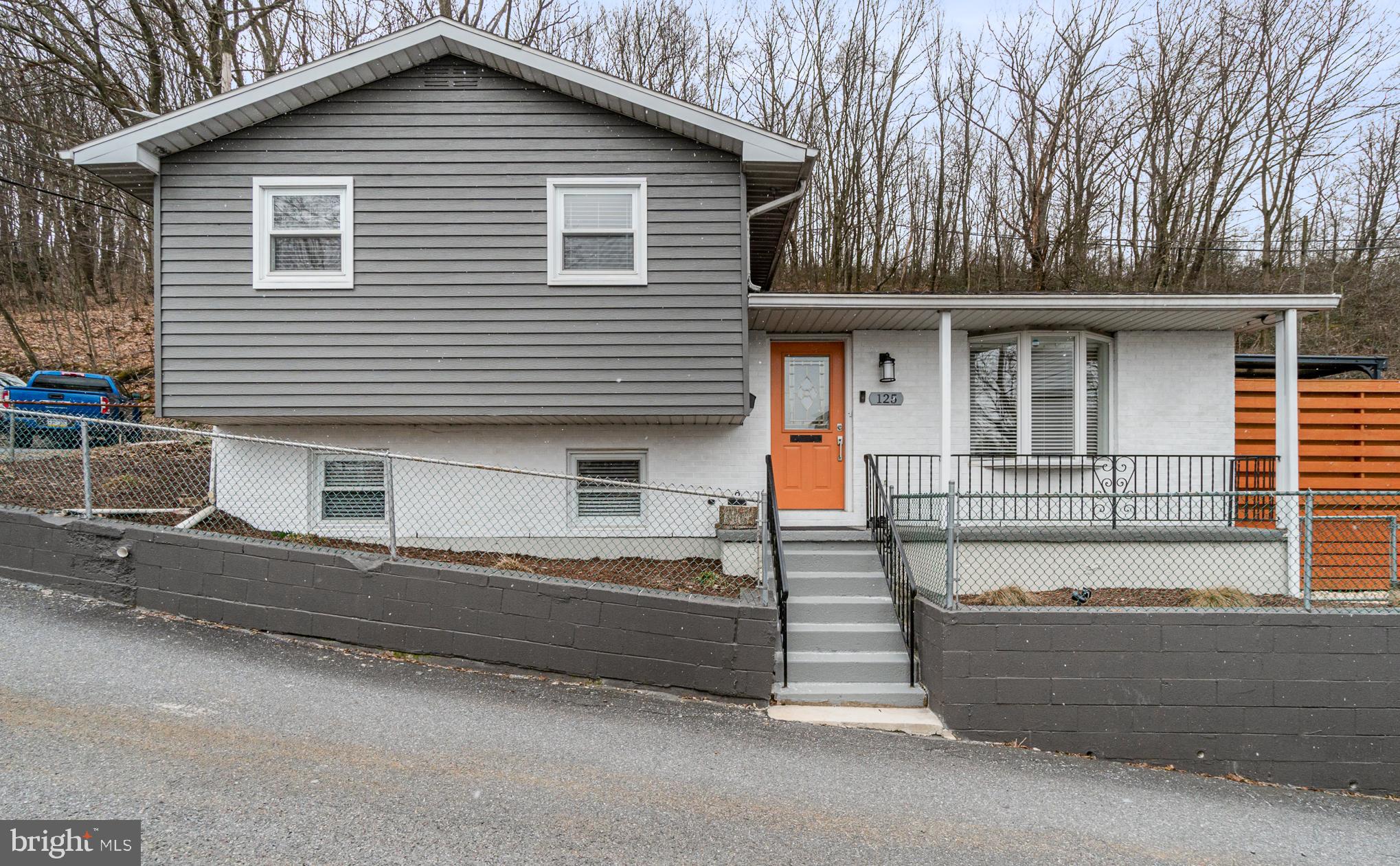 Move in Ready!! This 3 bedroom, 1 1/2 bath, split level home boasts an insanely gorgeous kitchen complete with top of the line appliances, plus an incredibly inviting decor with too many amenities to list! This newly renovated beauty is situated on the edge of town and a well planned outdoor living space was created to entertain. Storage shed on property and a paved off street parking space. Showings start MONDAY June 9th ... get your pre-approvals ready!!