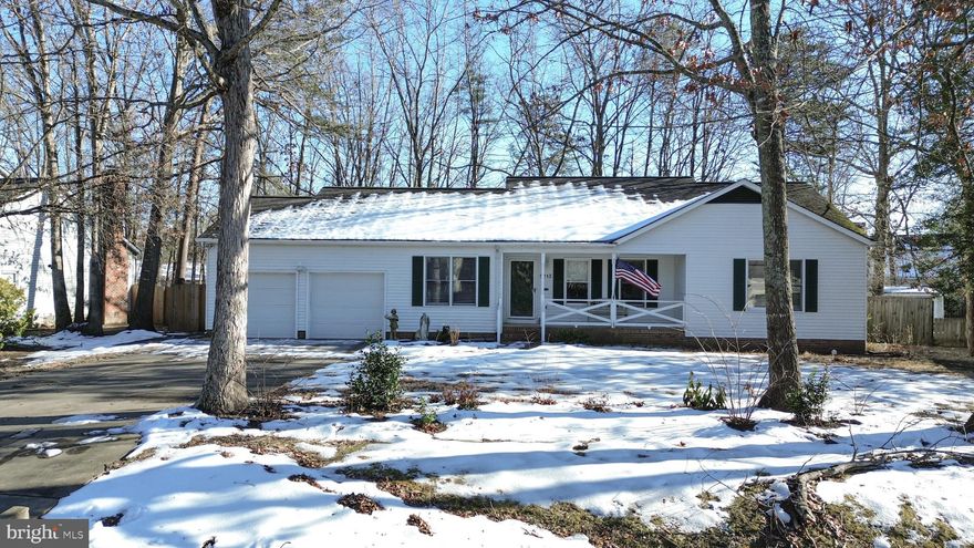 This charming rambler with a cozy front porch is the perfect place to call home! Move-in ready, it boasts fresh paint and new carpet throughout, providing a clean, modern feel from the moment you step inside. Featuring 3 bedrooms, 2.5 baths, and a 2-car garage, this home is ideally located just minutes from shopping, schools, I-95, and all essential conveniences, offering the perfect balance of comfort and accessibility. Inside, you'll find an open living room and formal dining room, with the large dining room easily adaptable for use as a home office. The kitchen is equipped with granite countertops and stainless-steel appliances, seamlessly flowing into the family room, which features vaulted ceilings and large windows that allow natural light to fill the space. The primary suite includes a full bathroom and spacious closet, while two additional generously sized bedrooms offer plenty of room for everyone. Outside, enjoy a rare find—a huge, fully fenced backyard with a great deck, perfect for outdoor entertaining or simply relaxing in your private space. Don't miss out on the opportunity to make this move-in ready home yours!