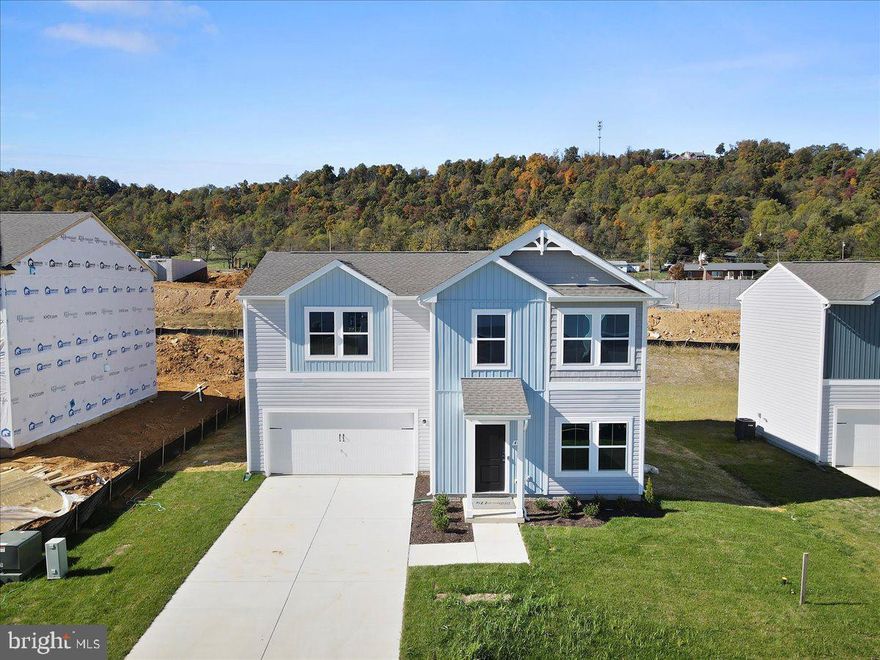 PRICE REDUCED! IMMEDIATE MOVE IN!! KHOVNANIAN'S ASPIRE FORSYTHIA Model Quick move in offers 4 generously sized bedrooms 2 full luxury baths/ 1 half bath, a large living area and full two car (or SUV) garage set on an ample home site! Dillon Farm community is situated perfectly with breathtaking Mountain views and convenient shopping and restaurants literally across the street!  Our main living area features a wide-open floorplan spotlighting a stunning professionally designed kitchen designed with our wildly popular all-inclusive upgraded Farmhouse Look. It's all here, luxury upgraded cabinetry, granite counter tops in kitchen and primary bath, kitchen island, open shelving, stainless steel appliances, black matte fixtures and faucets, vinyl wood look flooring! Energy Efficient- Propane heating and hot water, Barricade Plus house wrap and 'Air Tite' energy seal package, 14 SEER air conditioning, low E double pane windows, insulated fiberglass front door and wifi thermostat, camera doorbell, keypad front door lock, 60" wall outlets for Wall mount TV's re a few more of the benefits of a new KHOV Home at Dillon Farm!  ALL BRAND NEW with a PWC WARRANTY! Furnished Model Now Open by appointment! Ask about Closing Costs paid by Builder with the use of K Hovnanian American Mortgage.