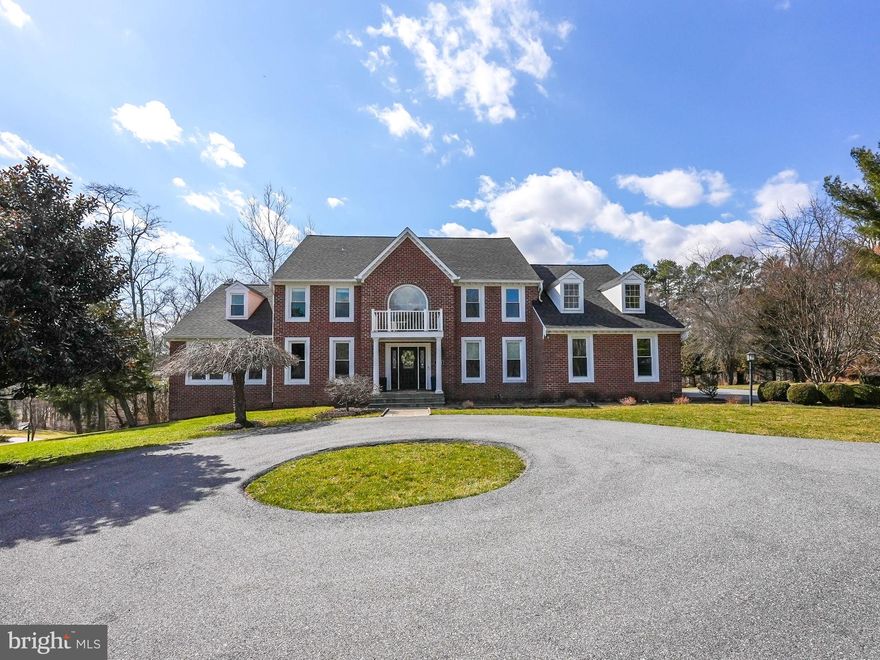 Stunning Custom-Built Colonial in The Chase – A Rare Gem on 3 Acres with Extensive Upgrades!

Welcome to this exquisite brick colonial in the sought-after community of The Chase in Ellicott City! Nestled on a private 3-acre lot, this meticulously maintained home has been fully updated with major renovations throughout, offering both elegance and modern comforts.

Step into the grand two-story foyer and take in the gleaming hardwood floors, crown molding, box wainscoting, soaring ceilings, and elegant French doors that define this home’s sophisticated charm. The gourmet eat-in kitchen is a chef’s dream, featuring granite countertops, stainless steel appliances, a center island, cooktop, wall oven, breakfast bar, and a sunlit breakfast room overlooking the picturesque backyard.

Designed for both entertaining and everyday living, the open floor plan flows seamlessly into the spacious family room with a cozy fireplace and deck access. The formal living and dining rooms are adorned with classic moldings, while the light-filled sunroom, private office, and library add additional luxury and functionality to the main level.

Upstairs, the owner’s suite is a true retreat, complete with two walk-in closets and a spa-like ensuite bath featuring a double vanity, soaking tub, and glass-enclosed shower with heated floors. Three additional spacious bedrooms, two updated full baths, and a convenient upper-level laundry room complete the sleeping quarters.

The fully finished lower level offers endless possibilities with a large recreation room, second kitchen, exercise room, den with built-in cabinetry, full bath, and ample storage—perfect for an in-law or guest suite.

Recent Upgrades Include:

✔ New HVAC System (2024) – Upper Level
✔ New Roof (2023)
✔ New Windows (2022)
✔New Water Heater (2019)
✔ Fully Remodeled Interior – First & Second Floors (2016), Entire kitchen renovation, custom soft-close cabinets, countertop, custom backsplash, extended island, all new stainless steel appliances GE Profile 
✔ All Hardwood Flooring Throughout
✔ All Bathrooms Updated with High-End Finishes (Heated floors in the master bath!)
✔ New Deck & Gazebo (2016)
✔ 9-Foot Ceilings in Basement
✔ Extensive Landscaping & Outdoor Patio Enhancements

Outside, enjoy professionally landscaped grounds, an expansive deck with a gazebo, and an extensive hardscape—offering the perfect outdoor entertainment space with room for a potential pool! The circular driveway and cul-de-sac location provide additional privacy and curb appeal.

Located in the highly-rated Howard County school district (Triadelphia Ridge ES, Folly Quarter MS, River Hill HS) and just minutes from shopping, dining, and major commuter routes, this remarkable home is truly a must-see!