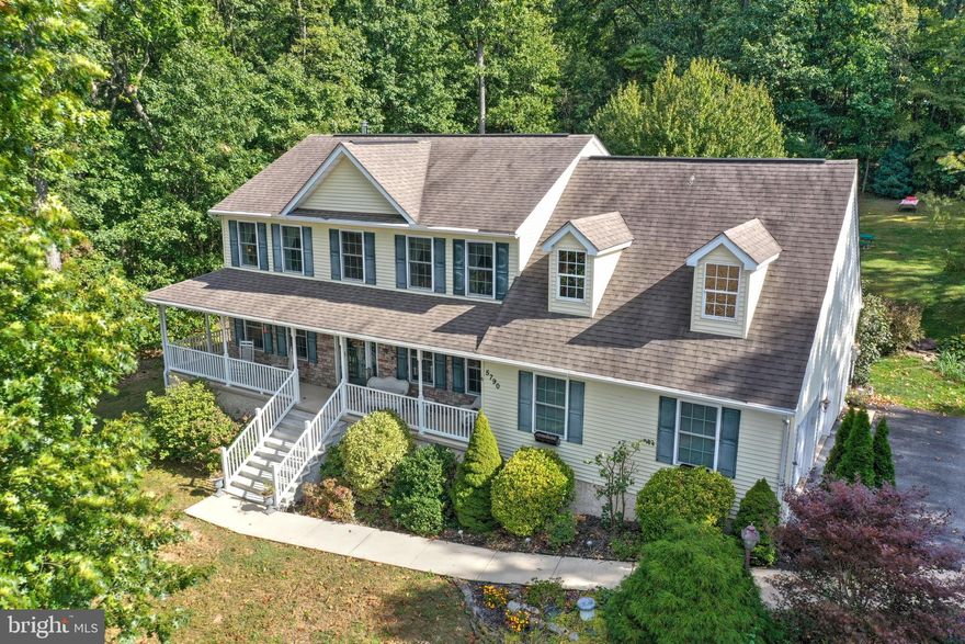 It's always 5 o'clock here, this amazing 4 bedroom 3.5 bath home sitting on 2.6 acres is home great for entertaining, with game room in basement with projection TV system, surround sound, wet bar, full bath, and second den in basement with cozy wood stove, upstairs offers front sitting room great for 1st floor office, separate dining room for your entertainments needs, family room with gas FP right off remodeled kitchen with snack bar seating in constant view of all company activities, kitchen access to expansive deck  with solar lighting, perfect for summer fun and sunning, outside your very own cabana and bar located off your 2 car detached garage, am I hearing happy hour time everyday, this yard would be perfect for a pool, Kitchen has been remodeled with new granite counters, flooring, sink, and tremendous walk in pantry, with organization to die for within  large mud room with outside access and garage access,  don't let me stop there the oversized 2 car garage does not disappoint with all the built in cabinetry as well, not to mention the secret room in the basement, that you will have to see to appreciate, master bedroom has vaulted ceilings, and 2 walk in closets, no fighting over closet space, soaking tub to relax after all your entertaining and 3 additional bedrooms for plenty of extra accommodations. new garage doors, propane gas furnace & central air replaced in 2005 & an extra bonus with an architectural roof 30 year roof in 2005. 200 amp electric & electric to the detached garage.