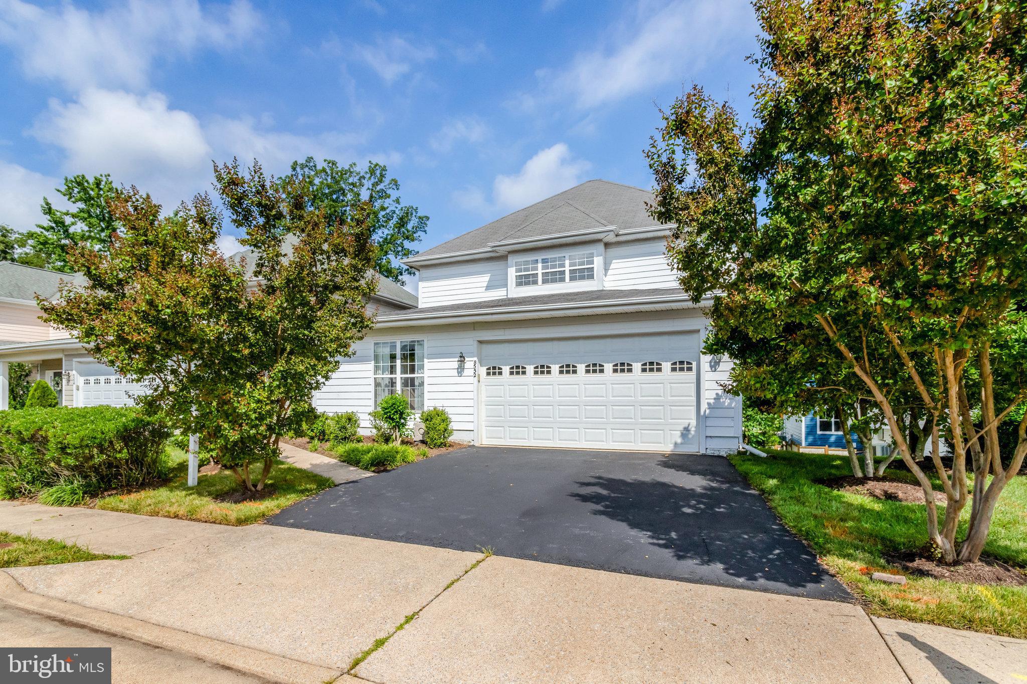 Step into refined elegance and modern comfort with this stunning contemporary colonial, perfectly positioned in the prestigious Wexford at Keene Mill community. Nestled in the highly sought-after neighborhood of Springfield, this expansive home spans three finished levels with over 3,700 sq ft, featuring 4 bedrooms + bonus room, 3.5 bathrooms and a 2-car garage. Enter to find an impressive main level featuring wood floors, sun-filled rooms, new paint throughout and new carpet. The highlight of the main floor is the rarely available primary bedroom suite with a wall of windows, ceiling fan, and a spacious walk-in closet. The luxurious primary bath offers a double white vanity and new sink hardware. The heart of the home lies in the recently renovated large eat-in kitchen, which is a chef's delight with all stainless steel appliances (new dishwasher 2025), gas cooktop, granite counters, double wall oven (2021), french door refrigerator (2021), gas cooktop, center island, and a breakfast bar area. Direct access to the rear deck making entertaining effortless. The living room features large windows and a cozy corner gas fireplace with a marble surround, while the adjacent dining room is perfect for hosting gatherings with its raised panel wall and a box bay window. Convenience meets functionality with a main floor laundry room, powder room with new vanity, mirror and hardware, and direct access to the 2-car garage. Upstairs, the second floor boasts a second primary bedroom with tray ceilings, walk-in closet, and a luxurious renovated bathroom with a double vanity with lots of storage, separate built-in cabinet, walk-in shower with glass door. Across the hall is the second additional bedroom with ceiling fan and large double closet. There is also a generously sized family room, which can be easily converted into a 5th bedroom or home office. The walk-out lower level offers high ceilings and includes a large recreational room with an oversized sliding door leading to the rear yard. There is also a 4th bedroom on the lower level, a third full bathroom, 2 extra storage rooms. Outside, the nicely sized rear yard provides a perfect setting for summer BBQs with a custom flagstone patio and built-in stone seat bench, cement siding, and with HOA covering lawn maintenance, you can enjoy the outdoors without the hassle. Recent updates include one HVAC, hot water heater (2017), new refrigerator and wall oven (2021) and a host of updates in 2025 including: new paint throughout, new dishwasher, powder room vanity, mirror and hardware, new carpet in the main floor primary bedroom, second floor and lower level. Prime location - just blocks to shopping and restaurants including Trader Joe’s, Starbucks, South Block and Springfield Country Club. Only a short 10 minute drive to Metro, 3 miles to I-395, I-95 and I-495, 14 miles to DC and 16 miles to Reagan Airport. Don't miss out on this rare opportunity to own a well maintained home with modern upgrades in a prime location. Schedule your showing today and envision the lifestyle awaiting you at Wexford at Keene Mill.