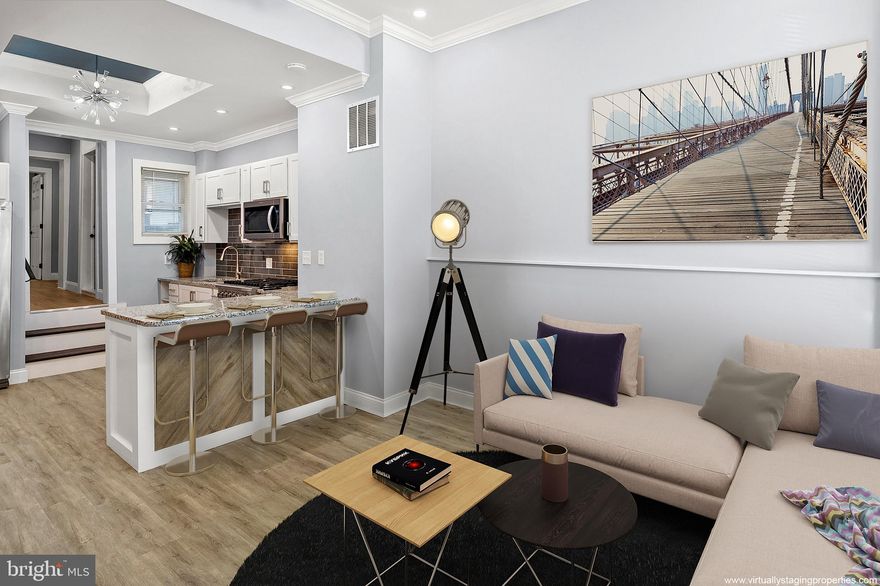 With 4 levels and nearly 2,000 square feet in the heart of Upper Fells Point, this beautifully renovated home is a blend of Century-old charm and modern amenities, and its layout provides plenty of flexible space. The main level’s open floor plan showcases the home’s primary living area, including a living room and kitchen as well as a half bath and laundry. The kitchen features white cabinets, a dedicated pantry, granite counters, ceramic tile backsplash, and new stainless steel appliances. The first level is anchored by one of three bedroom suites, which has a sitting room, a full bath, and access to the back yard. Levels 2 and 3 each have a private bedroom suite with a sitting room and full bath. The semi-private back yard features a block wall surround and offers alleyway access to the street. An unfinished basement houses the utilities and provides additional storage space. Bathroom renovations include ceramic tile enclosures, new lighting and plumbing fixtures, and ceramic tile flooring. Additional recent renovations include fresh paint, new floors throughout, new staircases, modern fixtures, electrical upgrades, new HVAC, and a new water heater as well as new water and sewer lines to the street. Convenient to John’s Hopkins Hospital, the Hopkins Shuttle, and the UMD Shuttle. Close to the Canton waterfront and Fells Point historical sites, restaurants, and entertainment! Ideal for home buyers and investors. This home has it all. Also for rent, MLS #MDBA2194268.