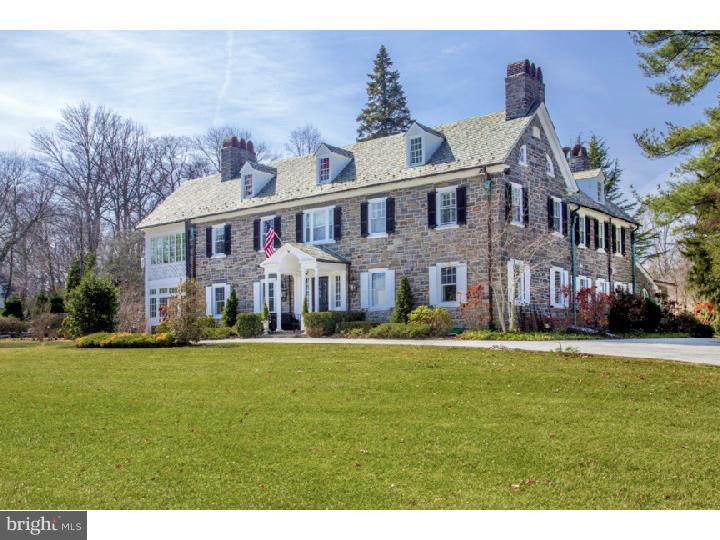 Stately Stone Colonial overlooking Merion Golf Club. Sitting grandly on sprawling grounds, and accessed by 3 gated entryways on Golf House Road and College Avenue is this Horrace Trumbauer 6 bedroom estate property with a swimming pool, pool house with recreation room, gym, kitchenette and bath, and detached 3-car garage with a 2nd-floor apartment. Recent renovations to the exquisite home are extensive and include: a jaw-dropping kitchen, extended family room, all redone baths plus a new bath on the 3rd floor, new heating, air conditioning and upgraded electric, a new 2-car attached garage addition with a mud room, laundry and powder room, luxurious master bath, custom master closet and much more. Elegant details flow from the Reception Hall throughout the 3 glorious stories. Generously-proportioned rooms provide optimal comfort for living and entertaining. The living room with a wood-burning fireplace, sunroom with 3 exposures, library with custom built-in cabinetry and gas fireplace, and dining room with built-in China cabinets and wood-burning fireplace are perfect settings for hosting guests. A butler's pantry with Carrera marble countertops, white cabinetry with glass doors, stainless steel sink, ice maker, wine fridge and Bosch dishwasher seamlessly serves the dining room, and connects to the exquisite gourmet kitchen that offers every bell and whistle for the discerning chef. A breakfast room leads to the gorgeous family room with a tray ceiling, gas fireplace, arched windows and built-in workstation desk. Upper bedroom levels are highlighted by the lovely master suite with a brick fireplace, and Carrera marble bath with rain shower and Whirlpool tub.