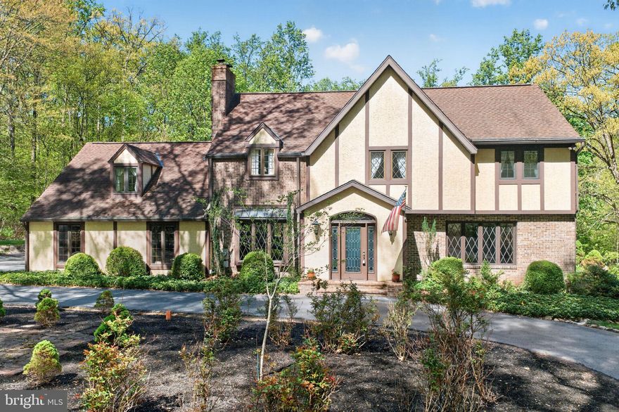 Set on a private 6-acre parcel bordering French Creek State Park, this 4-bedroom, 2.5-bath home offers 3,472 square feet of well-maintained living space in a peaceful, natural setting. Mature tree lines, walking paths, and established landscaping create a quiet backdrop for everyday living.

Inside, the home is thoughtfully laid out with a balance of formal and casual spaces. The living and dining rooms provide traditional areas for entertaining, while the kitchen opens to a bright breakfast area and flows into a spacious four-season room with vaulted ceilings, fireplace, and expansive windows overlooking the property.

Upstairs, the primary suite includes a sitting area, dressing space, and private bath. Three additional bedrooms and a full hall bath complete the second floor. The finished lower level offers flexible space for recreation, hobbies, or additional entertaining.

Outdoor living is a standout feature with an in-ground pool, pavilion, and patio areas designed for relaxation and gathering. The setting offers direct access to nature while still being conveniently located near the charm of St. Peters Village and its local shops, dining, and trails.

A unique opportunity to own a spacious home with privacy, acreage, and close proximity to one of the area’s most desirable outdoor destinations.