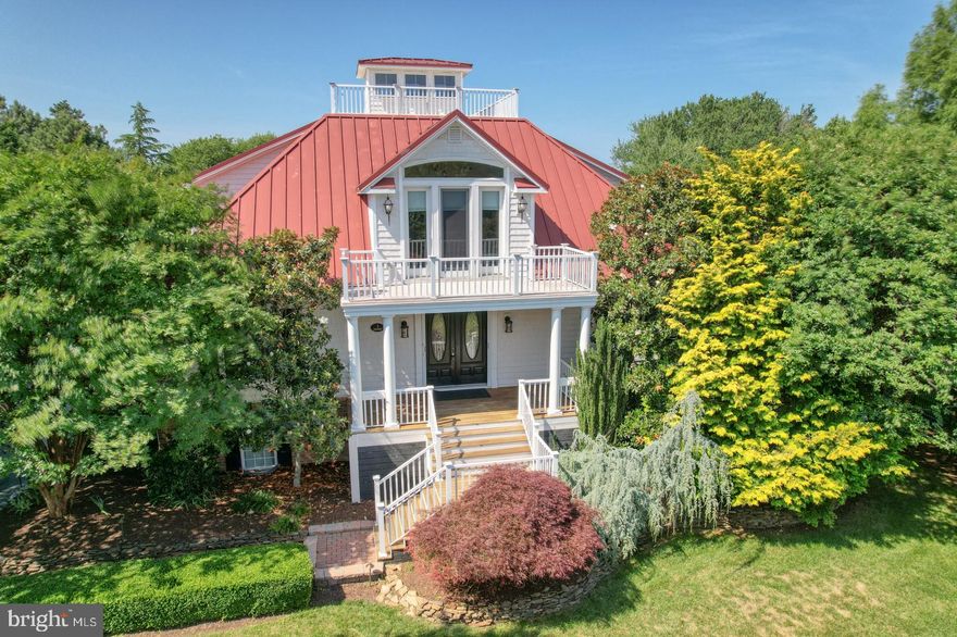 Don’t miss this one-of-a-kind Southern-inspired coastal home in sought-after Wolfe Pointe! Located EAST of Route 1, this 5,500 square foot beauty has plenty of room for everyone with 6 bedrooms, 4 1/2 bathrooms, large office that could be an additional bedroom and plenty of outdoor space to enjoy this property’s unbelievable views of the Rehoboth/Lewes Canal from every angle! When you aren’t relaxing on one of the 4 decks or 2 screened-in porches, you can take a swim in the 40’ heated, saltwater pool with travertine tile in your fenced-in backyard, perfect for quiet summer days or entertaining friends!

Home was recently staged.  The newly renovated ground floor features approximately 2,000 square feet and includes a 3 car garage, garden room, storage room, full bathroom, additional kitchen area, and two additional bedrooms – all within steps from the pool! Take the elevator up to the second floor or enter through the front door to find the main living space featuring hardwood floors and a breathtaking grand staircase to the third floor. The main floor also includes a spacious dining room, family room with custom built-in storage solutions and a gas fireplace, large office with tray ceiling, and kitchen with oversized pantry, upgraded cabinets and finishings, stainless steel appliances, a wine fridge, and beautiful countertops. Natural light streams into the home thanks to floor-to-ceiling windows in the main living space and multiple access points to the 3-season room and multiple decks. Also located on the main level of this luxurious home is the primary suite, which includes vaulted ceilings, a spiral staircase to a spacious sitting area with closets for storage, and a must-see his-and-her-sided bathroom with a stand-alone shower with multiple shower heads and soaking tub. Fall asleep to the warmth of the gas fireplace or incredible nature views through your floor-to-ceiling windows and circular balcony. A true highlight of the second floor is the large deck overlooking the Lewes-Rehoboth Canal. Constructed with Brazilian hardwood, the view is everything! This isn’t the only place you’ll find this incredible decking material. Both back decks and the front porch are all made of durable Brazilian hardwood! The next stop is the quiet third floor which includes 3 generously sized bedrooms, 2 full baths, and another beautiful screened-in porch. The icing on the cake is the incredible Widows Peak, with panoramic views of Lewes Beach, the Atlantic Ocean, the Rehoboth/Lewes Canal, and more! Observe from the enclosed “nest” or step out onto the rooftop for even better views!


In addition to all the upgrades and luxury you’ll find at home, you can also enjoy community amenities and social events, including 2 swimming pools (1 for adults and 1 for children), lighted tennis and pickleball courts, and landscaped common areas. Tucked away in a serene location yet close to all that Downtown Lewes, Lewes Beach, and Cape Henlopen State Park have to offer, this is one dream home you won’t want to miss! Schedule your private showing of this coastal masterpiece today!2150