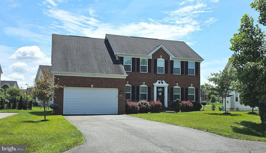 GREAT pricing  for the Oak Creek Club gated community! This beautifully well-maintained Ravenna model colonial detached home, located in a cul-de-sac, is what you’ve been dreaming about. Offered by the original owners, this brick-front home features: 4 bedrooms, 2 bathrooms and Laundry Room on upper level; Den, Formal Dining Room, Living Room with fireplace, Eat-In Kitchen, Sun/Florida Room, Office, a half bathroom and access to 2-car Garage on main level; Family Room, Theater/Media Room, Utility Room with storage and rough-in (for additional full bathroom) on the lower basement level. The home’s character is in the details… open floor plan, oversized kitchen island with cabinets and seating, beautiful Luxury Vinyl Plank flooring on main level, stylish and artistic lighting fixtures throughout, recessed lighting, electric fireplace, light filtering custom Roman Shades and two 2 large walk-in closets (one with space saving Barn Door) in primary suite, Soaking Tub in primary bathroom, seat riser with lighting in Theater Room, tankless gas water heater and overhead storage in the 2-car garage. The home also comes with a 1-year AHS Home Warranty and Washing Machine Credit as house warming gifts to the new homeowners. Community amenities include clubhouse with swimming pool, The Grove restaurant, Oak Creek Golf Club featuring an 18-hole championship golf course, tennis courts, community playgrounds, walking and biking trails, and 24-hour security. Easily access DC and points throughout the DMV area for business, education, shopping, entertainment, restaurants, places of worship, sports arenas/stadiums, marinas and airports by way of MD-202, MD-214, MD-50 and I-495, or conveniently take Metro Rail at Largo Town Center (less than 15 mins away). Nearby points of interest: Woodmore Towne Center (14 mins), Bowie Town Center (16 mins), PG Community College (9 mins), FedEx Field (13 mins), Bay Sox Stadium (16 mins), Watkins Regional Park and Nature Center (6 mins), UM Capital Region Medical Center (11 mins), UM Bowie Health Center (18 mins), Kaiser Permanente (10 mins), U.S. Census Bureau (20 mins), Joint Base Andrews (21 mins). Come make this home, and the Oak Creek community, your sanctuary!