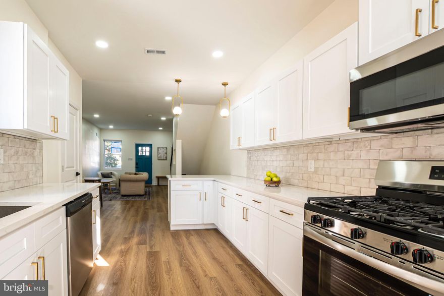 Fully renovated, move-in-ready home with a walkout basement apartment—offering livable luxury rarely found in 19138. 

Everything has been considered in this full-scale renovation—delivering move-in-ready, livable luxury rarely found at this price point.

Welcome to 7230 Briar Road, where modern design, thoughtful layout, and brand-new finishes come together in a home that truly stands apart.
The main level features a brand-new contemporary kitchen with shaker cabinetry, quartz countertops, brass hardware, stainless steel appliances, and a designer tile backsplash. A stylish half bath for guests, new flooring, fresh paint, and upgraded windows create a bright, seamless layout perfect for both everyday living and entertaining.

Upstairs, you'll find three nicely sized bedrooms with great natural light and a fully updated hallway bathroom with designer tile, modern lighting, and matte-black fixtures.

The lower level is a full walkout basement apartment with a private bedroom, modern bathroom, laundry hookup, exterior entrance, and flexible use — ideal for in-laws, extended family, guests, or rental income.

Step out onto the brand-new deck directly off the kitchen for effortless outdoor living.
Every surface has been refreshed or replaced — offering a rare opportunity to move right in and enjoy without lifting a finger.