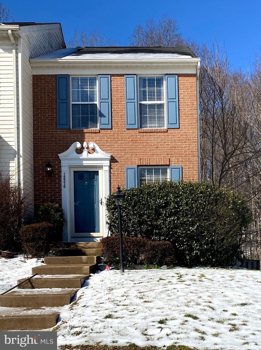 Lovely 2 Bedroom and 2.5 Bath End Unit Townhome in Ashland backing to woods for privacy. Freshly  painted throughout, new carpet, bathroom floors. Includes an open eat-in kitchen with corian counter tops and stainless steel appliances. Fully finished basement w/ gas fireplace,  full bath and walk out to fully fenced  backyard. HOA amenities include, play grounds, tennis courts, community pool, club house w/gym.