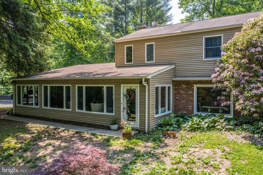 Looking for a private home tucked away but quick access to main commuter routes including back roads to DC? This charming home sits on 1 acre and is surrounded by an abundance of wildlife and nature. With access to Verizon Fios or Xfinity, the home is fully wired with professional grade networking equipment for uncompromising performance when working from home (home network system can be purchased separately from seller)! Entering the driveway you'll notice gorgeous concrete molded block retaining walls to the back yard, a new paver patio with lights and a fire pit for enjoying summer nights under the stars. Walking to the front door extra large Anderson picture windows really brings the outside in, filling the sun room addition with natural light. This cozy room is perfect for enjoying all seasons with a heating/cooling split system and pretty brick backdrop.  First impression are lasting in this charming living area- a pellet stove insert amidst a classy brick fireplace and mantle, flowing light oak hardwood floors takes you to the kitchen, the true heart of this home. Built with entertaining in mind, the kitchen is warm and inviting including a built in breakfast bar, gourmet downdraft cooktop and wall oven for preparing large holiday meals, built in desk area and pantry, recessed and pendent lighting; this is the gathering room AND the kitchen island conveys! Up the hardwooded stairs you'll see tons of natural light filling in from the window at the landing, the hardwoods continue down the hall that leads to 3 generous sized rooms (each with a brand new ceiling fan) & 2 full baths. This home also offers an oversized 2 car garage with additional storage. Recent upgrades include: Water heater (2018), plumbing in utility area replaced (2018), 40amp hook up for generator, water storage tank (2018), water filtration system (owned and maintenance 2x/year), cooktop + dishwasher (2021). Septic upgrades (2020): Replaced septic conveyance line (PVC) from house to tank, + line from tank to 3 brand new dboxes + replaced all header lines. Whole house freshly painted. Don't miss an opportunity to call it home!