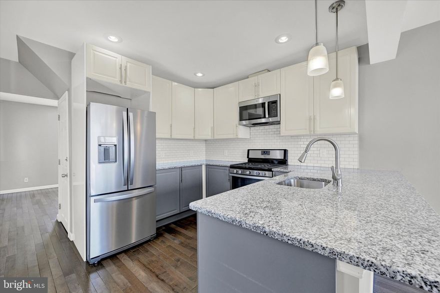 Don’t miss this beautifully updated Cape Cod in Nottingham, where thoughtful upgrades meet everyday flexibility. With 4 bedrooms and 3 full baths across three finished levels, this home adapts easily to the way you live. The main level sets the tone with rich hardwood floors and recessed lighting that create a warm, modern feel from the moment you enter. The eat-in kitchen is both stylish and functional, featuring granite counters, stainless steel appliances, and a breakfast bar that naturally becomes the hub for morning coffee, casual meals, or gathering with friends. Two bedrooms and a full bath on this level offer convenient, one-level living when needed. Upstairs, the private owner’s suite feels like a true retreat, complete with a full bath and a spacious walk-in closet that gives you room to breathe and stay organized. The fully finished basement adds another layer of versatility with new LVP flooring, a generous recreation space, an additional bedroom, and a full bath, ideal for guests, extended stays, or a dedicated work-from-home setup. Step outside to the covered rear porch and take in the wide-open 1/4-acre yard. Whether it’s weekend cookouts, letting pets run, or simply unwinding at the end of the day, this outdoor space delivers the kind of freedom that’s hard to find. Tucked in a convenient location near Rt 1, I-95, and 695, you’ll have easy access to wherever the day takes you while still enjoying the feel of space and privacy at home. A well-rounded home with room to live, work, and grow, schedule your showing and see how it fits your next move.