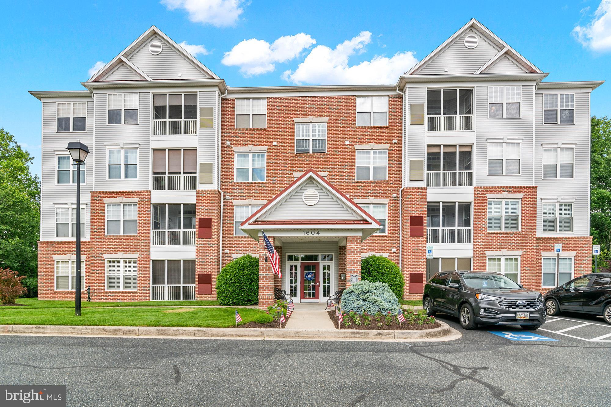 Welcome to this 55+ Living, beautifully maintained top-floor unit in the desirable Greenbriar Hills community. This spacious 1,240 sq ft unit offers 2 bedrooms, 2 full bathrooms, and a versatile den—perfect for a home office, guest room, or reading space. Enjoy 9-foot ceilings and an open-concept layout that creates a bright, airy atmosphere throughout. Located in an elevator-equipped building, this unit combines top-floor privacy with easy accessibility. Greenbriar Hills residents enjoy a host of amenities including a community pool, tot lot, and a clubhouse ideal for gatherings and events. Whether you're seeking comfort, convenience, or a low-maintenance lifestyle, this top-floor gem has it all.