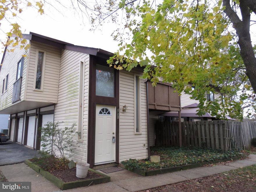 Contemporary two story 3BR/2BA condo with an attached garage and balcony that overlooks the common grounds and lake.  Condo features a large master bedroom with walk-in closet and an ensuite master bathroom.  Separate dining room open to the living room is an ideal place to hold small gatherings.