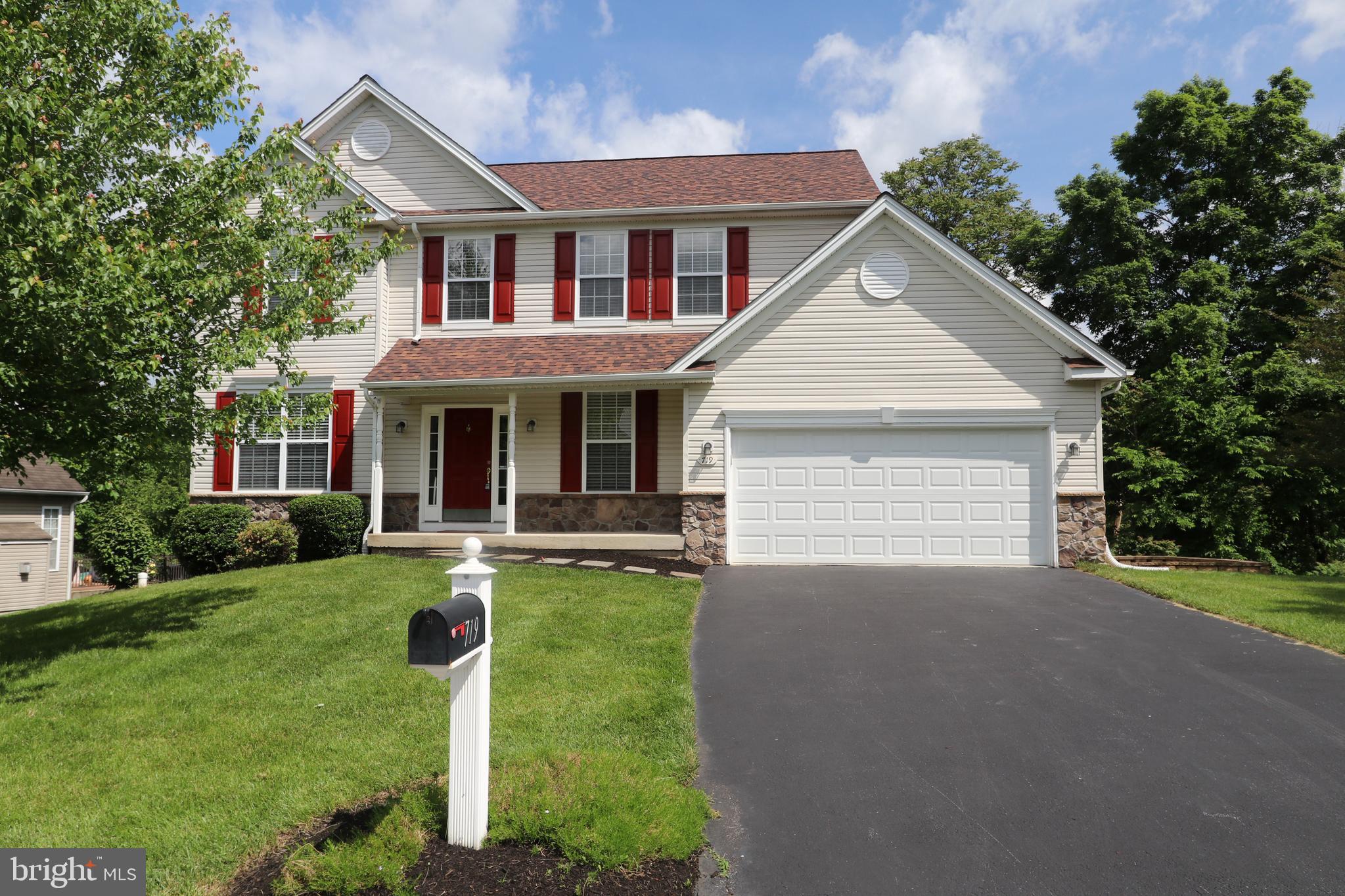 Vinyl & Stone Colonial overlooks trees as well as being located next to the community open space gives you much added recreational space and privacy. Meticulously cared for home, upgraded with tons of user friendly features for convenience .  Open floor plan with 9ft ceilings,  Foyer entry, Formal Living Room and Dining Room, Island Kitchen with 42 inch cabinets, pantry and stainless steel appliances. Breakfast Room with sliders to the 12 X 16 deck adjoins the Family Room with fireplace featuring a built-in electric blower for real heat. First Floor Powder Room and  Landry Room with sink and custom shelving complete the first floor. Primary bedroom features luxurious Primary bath with frameless shower & soaking tub, double sinks and his and her walk -in custom closets. 3 additional good size rooms and  full hall bath with double sinks. Upgraded dimmable lighting fixtures in most rooms, ceiling fans in all rooms.   Walk out Lower Level with handy built-in shelving.  2 blocks to  Rainbow Elementary school, walk to the nature trail up the street & community playground. New  Garage Door (2017), HVAC (2019),  Roof (2020)( w/transferable warranty), Hot Water Heater(2021), Dishwasher(2021),  Refrigerator (2021), Water Softner & RO Filtration System (2021) Kitchen Faucet & Floor (2022).