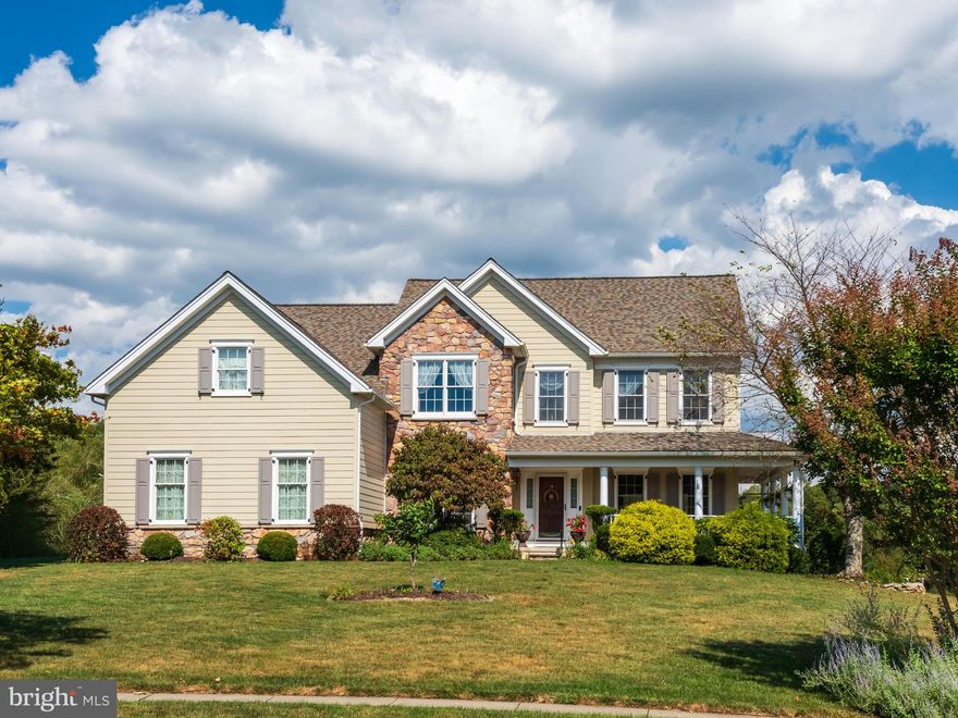 West Bradford Beauty in the Heart of Chester County!

Located in the highly sought-after Downingtown School District, this elegant home sits in the desirable community of The Estates of Tattersall,  bordering the scenic Broad Run Golf Club. Nestled among the rolling hills of Chester County, the property offers stunning views, curb appeal, and timeless charm.

The exterior has been fully upgraded , including HardiPlank cement siding, all new window frames, plus recently replaced roof & gutters-ensuring beauty, durability, and peace of mind for years to come.

Step onto the wrap-around front porch and into a stately two-story foyer. The formal living and dining rooms flow seamlessly, perfect for entertaining large gatherings. Rich hardwood floors, crown molding, chair rail, and oversized windows add warmth and sophistication.

The gourmet kitchen features granite countertops, stainless steel appliances, an island with seating, and a sunny breakfast area that opens to a large rear deck. The kitchen overlooks the inviting family room with vaulted ceiling, back staircase, and wood-burning fireplace with insert. A private office and laundry room complete the first floor.

Upstairs, the spacious primary suite includes a sitting area, spa-like en-suite bath, and a huge walk-in closet. Additional 3 bedrooms & Hall Bath provide comfort and flexibility for family and guests.

The finished walkout lower level is designed for fun and relaxation, offering recreation, music, gym, bar areas plus separate hobby room.  Step outside to the covered patio which leads to a stone pizza oven—perfect for entertaining!

The magnificent backyard with sweeping views is both private and peaceful. Located on a quiet cul-de-sac, yet minutes from West Chester Borough and Downingtown, this home offers the best of convenience and tranquility.