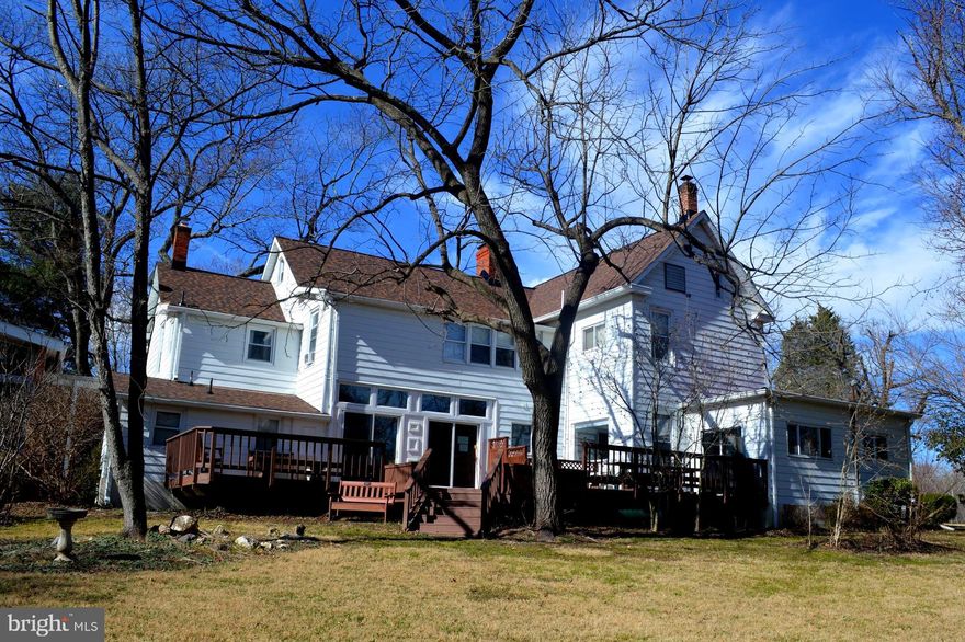 Located in an agricultural preserve on 27.82 acres, a 1915 Colonial Revival/Victorian home is the main attraction of this pastoral estate.  Augmenting this  spectacular, bucolic property is a guest house, cottage and garage/storage building.  ***** MAIN HOUSE -  Main Level: Entry foyer, two offices, library, living room, large formal dining room, country eat in kitchen (Viking gas stove, loads of cabinets and counter space, island, bay window), sun room, 2 full baths, 2 half baths, large event sized, gathering room with raised platform.  Upper Level: 6 bedrooms (CAN SLEEP 18), full bathroom, walk up to attic.  ***** GUEST HOUSE - Full kitchen, living/dining space, 4 bedrooms (CAN SLEEP 8), 1.5 bathrooms. *****COTTAGE - Kitchen, living area, 3 bedrooms, 1.5 bathrooms.  *****OUTDOORS - expansive deck, patio, outdoor chapel, labyrinth, meditation garden, gazebo, pine grove, fire pit, walking trails and organic vegetable garden.  *****ARCHITECTURAL FEATURES - 2 staircases, transoms, bulls eye molding, chair railing, high ceilings, plaster walls and solid wood flooring,  3 fireplaces. There are endless possibilities for usage: RETREAT/CONFERENCE CENTER, BED AND BREAKFAST, RELIGIOUS GROUPS, GROUP HOUSING, DAY CARE, FARM.  SEE LAST ATTACHMENT; THIS OUTLINES THE 72 YEAR HISTORY OF SANCTUARY.  PRICE REDUCED $300,000