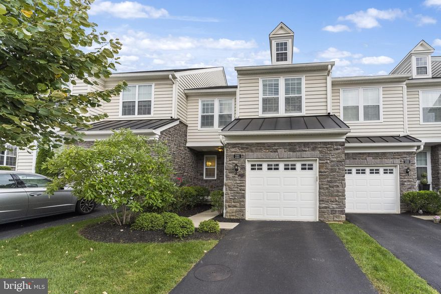 The Oaks at Lafayette Hill!!   Welcome home to 221 Ella Ln.   The most popular Barbour floor plan that looks and feels like a model home.    You will love the sun filled open floor plan that is ideal for entertaining and comfortable living.     The chef's kitchen features expanded island, farm sink and complete upgraded appliance package and breakfast room.   Main level flex room is ideal for a formal dining room or home office.  The upper level primary bedroom is a true oasis with vaulted ceiling, 2 walk in closets and a beautiful en-suite bathroom.    Two additional bedrooms,  hall bathroom and laundry area complete the second level.   More things to love about this home:  hardwood floors throughout, welcoming front porch and entry foyer, rear deck and so much more.   The Oaks at Lafayette Hill is located in the most convenient area of Whitemarsh Township, you  are minutes away from the Spring Mill Train Station,  The Schuylkill River Trail,  Main highways,  township parks.  Award Winning Colonial School District!