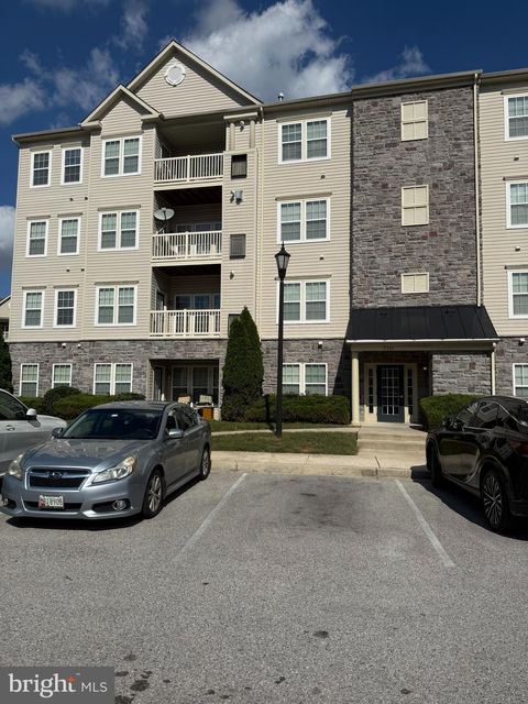 Photo of 5303 Wyndholme Circle #401, BALTIMORE, MD 21229 (MLS # MDBA2185310)