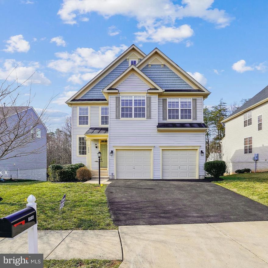 Truly like a MODEL HOME.  This immaculate, light-filled colonial is ready for you to move in!  Great for entertaining -- it features a two story foyer, an open plan main level with a formal dining area opening onto the great room with a gas fireplace, a chef's kitchen with a large center island, and a multi-function morning room.  Upstairs there are four bedrooms including a large owner's suite with sitting area, two walk-in closets, and a super bath with dual vanities, soaking tub, and walk-in shower.  The upstairs has a laundry room with built-in shelving and a hall bath with dual vanities.  The WALK-OUT lower level has an immense recreation room and huge bedroom that connects to the full bath and has its own walk-in closet.  There is new lighting through much of the house, a very recently paved driveway, a new refrigerator, new carpet, new garage door openers, and fresh paint throughout.  There are even solar panels to minimize your electric bills.  Close to shopping including Wegmans, restaurants, and major transportation routes.