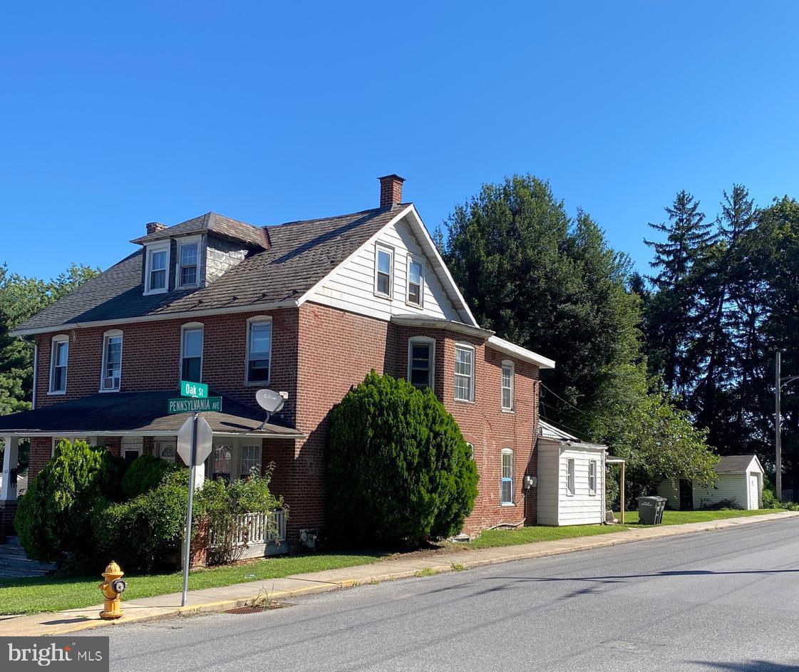 This solid brick twin perched high on Pennsylvania Avenue is full of potential and ready for transformation. Featuring a welcoming front porch, spacious rooms, and a classic layout, this property provides the perfect foundation for your next project. Inside, you’ll find generous living spaces with plenty of natural light, offering endless update potential. The large bedrooms and flexible floor plan make it easy to reimagine this home for today’s market. Whether you’re looking to complete a profitable fix-and-flip or add a long-term rental to your portfolio, this home is an excellent opportunity. Its desirable location, solid brick construction, and size make it stand out from the typical rehab project.
Bring your vision and creativity — the potential here is undeniable. Call today to schedule a showing and see the possibilities for yourself!