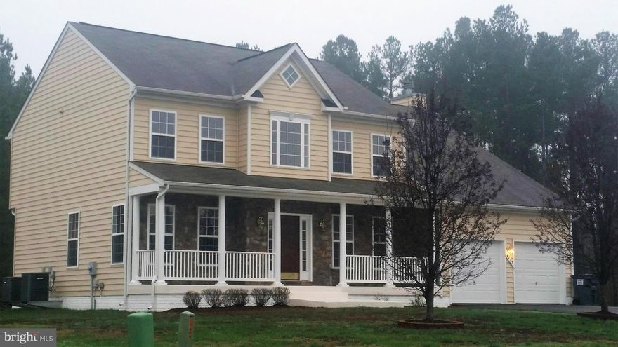 Stunning 4-5br stone front colonial. This home has all the amenities and features: granite, custom trim, hardwood, custom tiled baths, sitting rm, professional paver patio, 9 ft ceilings 1st floor and basement. Walk-up basement, 2-zone HVAC. Gourmet kitchen w/ center island, cooktop, double oven and large eating area. Columns stand between LR and DR. Has a large library/office off 2-story foyer.