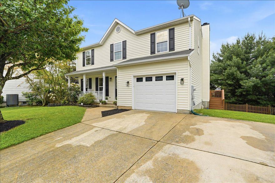Welcome to this beautifully appointed single-family home in the highly sought-after New Market West community! Tucked away on a cul-de-sac and walkable to local schools, this home offers the perfect blend of comfort, style, and functionality. Featuring 5 bedrooms, 3 full baths, and 1 half bath, the thoughtfully designed layout is ideal for both everyday living and entertaining. The heart of the home is the stunning kitchen, complete with a massive quartz island, stainless steel appliances, oversized sink, and seamless flow into the dining area and cozy living room with fireplace and deck access. Just off the dining space, the walk-in pantry is a true standout with additional counter space, soft-close cabinetry and drawers, beverage fridge, and nugget ice maker. The main level also includes a welcoming foyer, private home office, and hardwood flooring throughout. Updated light fixtures throughout most of the home add a fresh, modern touch. Upstairs, the spacious primary suite features an ensuite bath with skylight, separate shower and toilet area, and a walk-in closet. All upper-level bedrooms include ceiling fans for added comfort. The finished lower level offers durable LVP flooring, a large rec room, full bath, storage areas, laundry space, and a versatile 5th bedroom currently used as a home gym. Enjoy outdoor living on the rear deck overlooking the backyard with fire pit. Residents of New Market West enjoy fantastic neighborhood amenities including two playgrounds, tennis courts, and a pavilion. This home truly has it all!