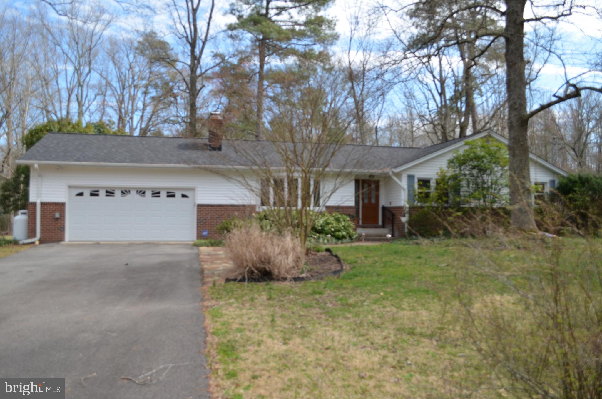 Beautifully maintained ranch style home with full partially improved basement on 1.38 ac. delightfully landscaped lot. Heat pump with oil backup, tankless hot water heater. Remodeled kitchen with gas stove, oven and TV. Hardwood floors. Basement level has a spacious family room, wet bar and pool table. Outdoor patio includes a pergola, fire pit and grilling area. Rent includes yard maintenance.