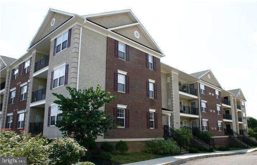 Beautiful 2 bedroom 2 bath condo within walking distance to downtown Skippack. This first floor unit has plenty of space and good flow throughout.  Upon entering you are welcomed to a cozy dining space attached to the kitchen area, which  flows to an oversized livingroom with fireplace.  Private balancy is off the living roomThe primary bedroom has plenty of space with it own bathroom. An additional bedroom and bathroom along with an in unit washer and dryer complete this space. The garage is below the building with one parking space and elevator access to your floor.