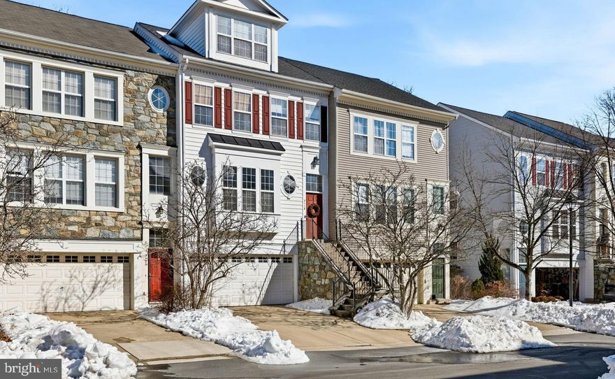 Welcome home to this beautifully updated and well maintained 4-level townhome Foxhall model with over 2,500 SF offering the perfect blend of modern upgrades, flexible living space, and everyday comfort. With 4 bedrooms, 3 full baths, and 2 half baths, this spacious residence has been thoughtfully enhanced so you can move right in and start enjoying it from day one.

The heart of the home is the newly renovated kitchen, featuring replaced stainless steel appliances—stove, dishwasher, built in microwave, sleek quartz countertops, and an open flow ideal for both daily living and entertaining. Hardwood flooring enhances the main living areas, while newer carpet adds warmth and comfort.

Enjoy indoor-outdoor living with both a private deck and a fully fenced yard and patio, perfect for morning coffee or tea, evening relaxation, entertaining guests, or giving pets a safe place to play. Freshly painted and newer recessed lighting throughout. Enjoy a spacious, finished 2-car garage with room for storage, projects, or hobbies.

Retreat to the primary suite, complete with a generous walk-in closet featuring custom built-ins, creating an organized and luxurious personal space. The top level offers a private fourth-level suite with its own full bathroom and custom built-ins, perfect for guests, a home office, or multi-generational living.
Some major systems have already been upgraded, including a new roof (2017) and a Trane air handler and heat pump for the upper level (2020) — providing peace of mind and long-term value.

Residents enjoy access to community tot lots and tennis courts, along with professionally maintained common areas that enhance both convenience and curb appeal.

One of this home’s most valuable features is its unbeatable location — just a half-mile to the Innovation Center Metro Station and a half-mile to the upcoming Rivana mixed-use center. You’ll also enjoy close proximity to a wide variety of shopping and dining options, easy access to Route 28, Route 267, and Dulles International Airport.

Don’t miss the opportunity to be part of a thriving and growing neighborhood — make this exceptional home yours today!