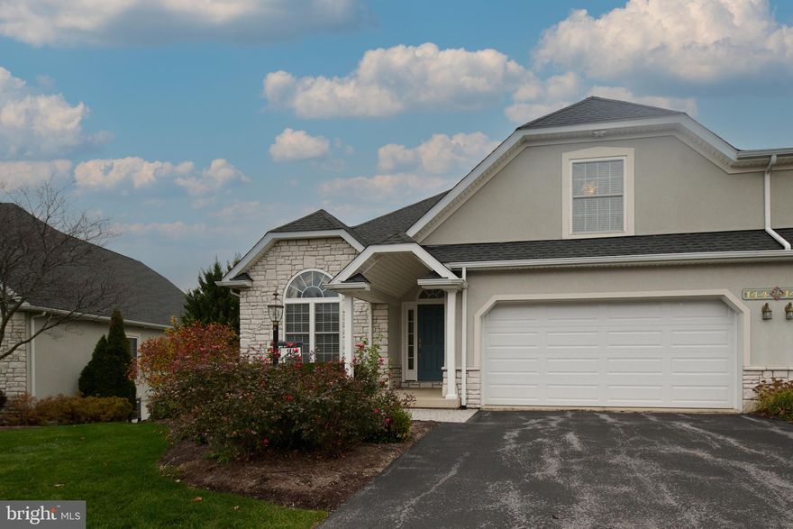 OPEN HOUSE - Sunday, December 7th, 11:00 AM - 12:30 PM.  Experience luxury condo living in the sought-after Cobble Creek Manor. This gorgeous home features three levels of living space with worry-free exterior maintenance. The main floor includes a spacious owner's suite with tray ceilings, a walk-in closet, and a cozy sitting room or office. The great room boasts soaring ceilings and a double-sided fireplace shared with the sunroom. The kitchen is outfitted with granite countertops and stainless-steel appliances. Each level has its own bedroom and full bath. The finished lower level, complete with a wooden bar and media center, opens to a serene patio, perfect for grilling. Conveniently located just minutes from downtown State College, Penn State campus, Rothrock State Forest, parks, shopping, and all the dining options Happy Valley has to offer.