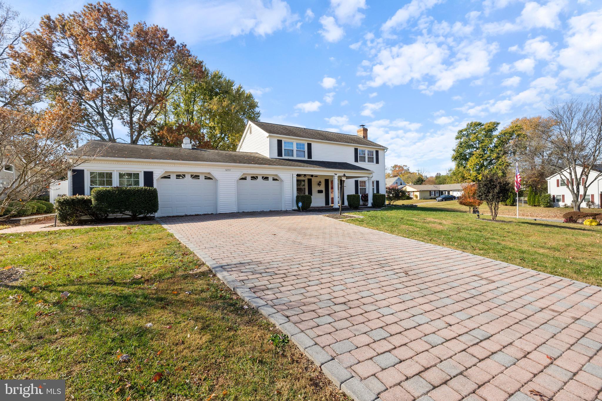 Back on the market at no fault of the seller. No issue with appraisal make this beautifully renovated colonial home boasts an attached 2.5-car garage that includes a workshop and a cedar closet. The remodeled kitchen is a standout feature, complete with granite countertops, a breakfast bar, and sleek stainless steel appliances. Bathrooms throughout the home have been updated, with the primary bath offering the added luxury of heated floors. The exterior showcases a charming paver front porch, as well as a driveway, walkways, and a spacious patio. Enjoy the summer months in your private in-ground pool, complete with a slide, and unwind in the hot tub during cooler nights. The home features durable LVP flooring, a privacy fence, and sits on a 1/3-acre corner lot, offering ample space and comfort.