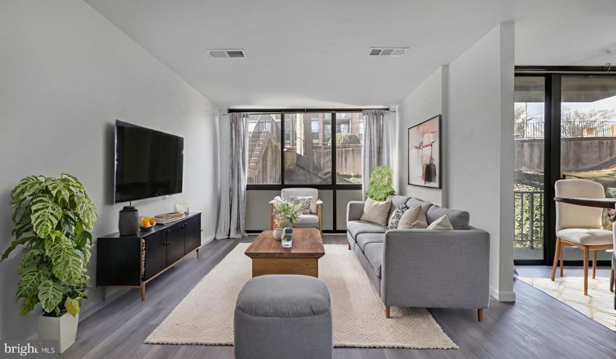 Move right into this beautifully remodeled Alexandria condo offering modern updates, great amenities, and unbeatable convenience. Enjoy a bright and spacious layout featuring new flooring throughout, fresh paint, and abundant natural light from large windows. The terrace off the living room provides a perfect spot for morning coffee or evening relaxation. **ALL UTILTIES INCLUDED IN HOA FEE!**

The gorgeous kitchen shines with brand-new cabinets and drawers, high-end countertops, chic tiled backsplash, and stainless steel appliances—including a refrigerator, dishwasher, built-in microwave, and oven. The separate dining area flows into a generous living room with updated lighting and a ceiling fan, creating a warm, welcoming space. The bedroom offers comfort and style, complete with an impressive walk-in closet. The updated bathroom features a new vanity and lighting for a fresh, contemporary feel.

This condo includes all utilities (gas, electric, water) and comes with one assigned parking space plus an additional guest spot for visitors. Community amenities include a swimming pool and laundry facilities for added convenience.

Perfectly located near top shopping, dining, and recreation—just minutes from Landmark Mall, Pentagon City, Costco, Target, Giant, and Harris Teeter. Enjoy local favorites like Clyde’s, The Carlyle, and Aslin Beer Company, or head outdoors along the scenic W&OD Trail. With easy access to Old Town Alexandria, Del Ray, Reagan National Airport, I-395, and I-495, this condo offers the best of comfort and connectivity.

Schedule your tour today—this move-in ready home has it all!