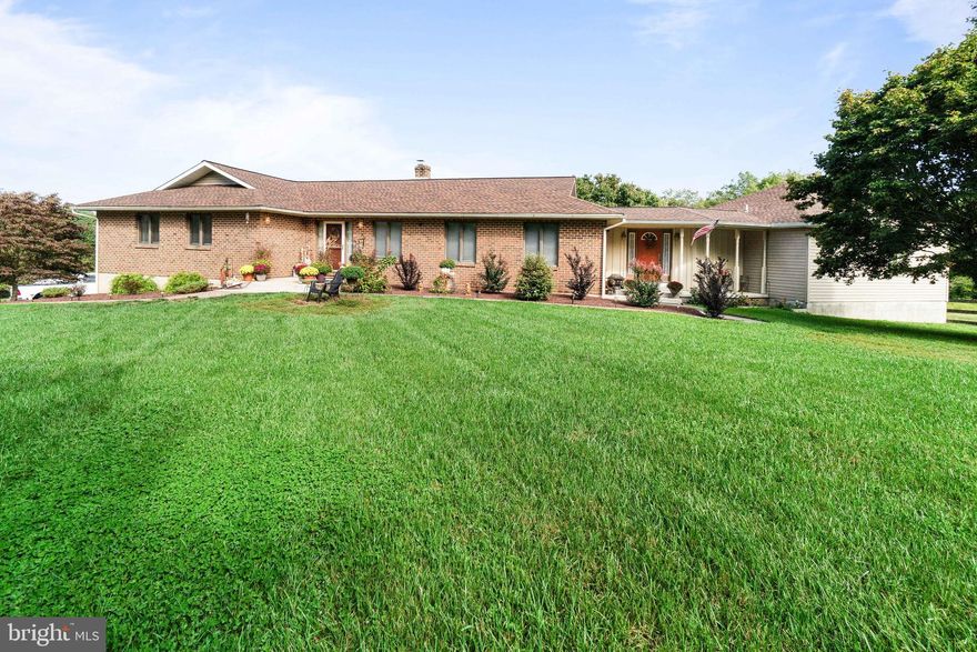 IN LAW SUITE. Only a family illness brought this property back on the market. Horses, beef animals, goats your choice can graze on these lush pastures all fenced.   6.7 Acres.. Take a walk down to the barns and see the horses or animals safe at play or maybe eating from their hay feeder.  Bank barn with 2 stalls , run in and hay storage, shed row barn has 3 stalls and a tack room.  4 fenced paddocks.  Wood and wire safety fencing make for running room for your sport horses or favorite pets.   TRACTOR INCLUDED IN THE SALE. Sit on the deck and look out over open fields of crops including vegetable and fruits. Surrounded by farm land. Large pond in view from the deck.  The 6.7 acres leaves room for lots of sports or play. Located 10 minutes from the Fair Hill Training Center,  Fair Hill Natural Resources  the future home to the 5 Star  International Equestrian Event and many horse events during the year. Fair Hill Nature Center is located near the training center. The Nature Center sits on over 5,000 acres of ground and has trails for hiking, biking and horse back riding. Located between Philadelphia and Baltimore with easy access to I 95, Route 40 and Route 1. Located in the corner of Maryland-Delaware and Pennsylvania.   Spacious rancher on the  6.7 acres with main level  In Law Suite with separate entrance and deck over looking the pastures and animals. In Law Suite includes living room, kitchen, bedroom and bath. Totally private. Main house is elegant with great flow for entertaining or just  family events. Kitchen has center island with Jenn-aire stove and stainless appliances. Open floor plan  features family room that includes wood burning stove and entry to large deck overlooking the grounds with a view of far away hills. Enter the front foyer with hardwood floors and a view of the family room with picture view. Go in to the Living room with hardwood floors and open to the main dining room also with hardwood floors. You will find a great view from any window in this rural setting. Master suite offers private bath and your own deck or room for a hot tub if so desired.  Master bath recently updated with walk in shower. Two additional bedrooms with plenty of closets.   Hall bath. Laundry room on the main level plus laundry  in the basement. ROOF NEW 2020, SIDING NEW 2020, UPDATED SEPTIC. Basement is unfinished and includes the attached garage plus work shop area.  .