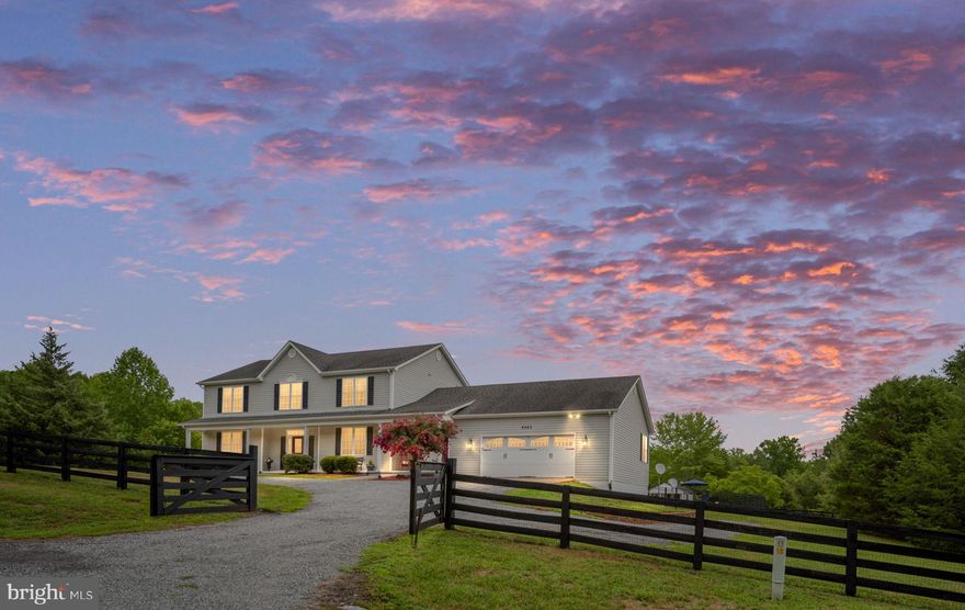 The sun, the moon, the stars- you can have it all!  Welcome to Fieldstone Acres- your five acre private homestead perfectly created for both people and pets!  Arrive at Fieldstone Acres by way of a circular driveway with new double entrance gates and split rail with wire fencing.  The roughly 3,000 sq ft home with a full front porch has double entry points and an oversized and extra deep two car attached garage.  Enter through the main entrance into the foyer that has been adorned with gorgeous dentil molding, chair rail, transom windows and extensive molding around the door.  Before we talk about each of the spacious rooms on the main level,  it is worth noting that the main level has 9 foot ceilings, 6" baseboards, and all the windows in this home and most all of the closet/pantry/storage doors have been expertly built out with beautiful moldings.  Virtually every room on the main level has crown molding and chair rail.  These stunning finishes truly set this home apart from others.  On the left is the formal living room with gas fireplace and to the right is a very large dining room with space for a hutch, server, and a corner cabinet.  As you make your way down the center hall on the right is a half bath with double sinks and a granite countertop for everyone to wash up for dinner.  At the end of the hall, you enter the spacious breakfast room with plenty of room to share a meal around a large table.  To the right is a show stopping, chef's kitchen with its massive 74" x 40" granite island and a double sized pantry closet.  There is an abundance of 42" raised panel cabinets that are beautifully glazed.  Your entire family can gather around this kitchen!  Off the kitchen is a large mudroom, or use it as an office, that has its own front and back entrances and a covered back porch overlooking the pool.  On the other side you will find the family room that has access to the screened porch.  Upstairs you will find an amazing owner's suite with crown molding, hardwood floors, ensuite bathroom, and walk in closet.  The primary bath has a jetted tub, double sinks with granite, water closet and a five foot shower.  There are three additional, generously sized bedrooms that share the hall, full bathroom.  Also upstairs you will find a double sized linen closet and a laundry room that is 10' x 6' feet with a full sized window, folding counter, and drying bar.  The back of the home is simply amazing.  The screened porch was updated a year ago with new carpeting, posts and railings.  In addition, there is a deck with grill/table space off this area.  You are steps away from a truly stunning inground concrete pool complete with a sitting bench and waterfall.  The pool goes from 3 feet to 8 feet deep and had its concrete reglazed and tiles replaced in 2023 along with a new pool cover.  A pool house holds all your equipment and chemicals.  Also on the property is a 32' x 28' barn with lean to and two doors for stall build out.  The barn has water and electric.  There is an additional lean to in the north pasture.  The previous owner used the property as a successful alpaca farm so the entire property has wire fencing and there are three additional areas that have split rail/wire fencing to create separate spaces.  The property is part of a one street neighborhood just 10 miles from the Spotsylvania-Orange county line near the Rt 3/Rt 20 intersection and 20 minutes from Culpeper.  Don't miss the opportunity to make Fieldstone Acres your paradise with its incredibly peaceful land, a beautiful home, a stunning high end pool, and a barn.