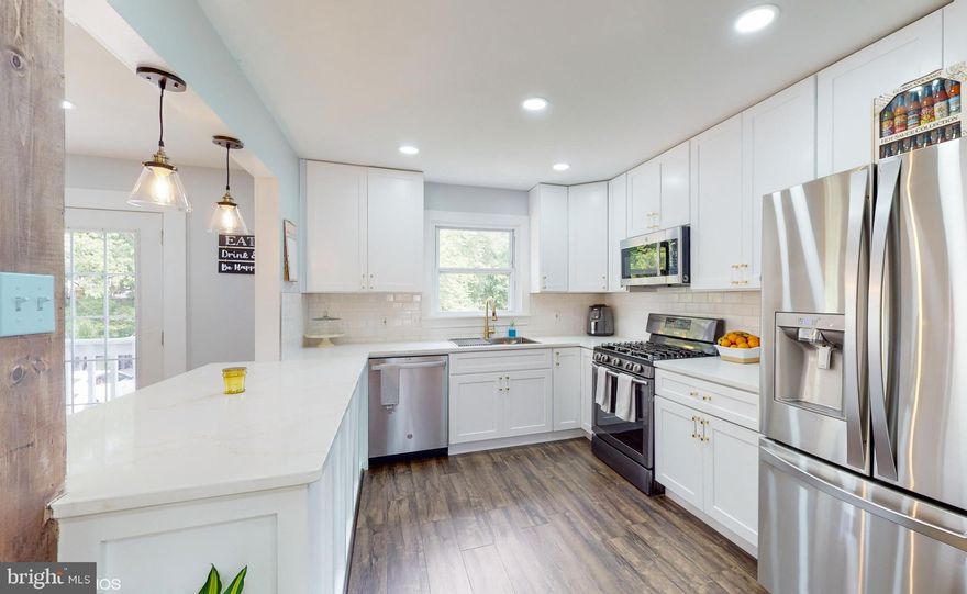 **Active Under Contract**Welcome to 20 Saint Agnes Rd. This is the one! With many beautiful upgrades throughout this ranch/rambler will stun you. As you arrive to this property, you'll noticed a well manicured lawn and a long driveway ending at a carport with space for 2 cars. A big backyard perfect for family gatherings or just relaxing during the summer nights with your very own pear tree and a fire pit for some S'mores!  Inside the home it just keeps getting better! With gorgeous hardwood flooring and Vinyl throughout, recessed lighting, a custom built-in TV wall mount electric fireplace!  A fully renovated open concept Kitchen with quartz countertops, custom cabinets, stainless steel appliances. Freshly painted throughout!  This 4 bedroom 2 bath with a basement home is the one you've been looking for!