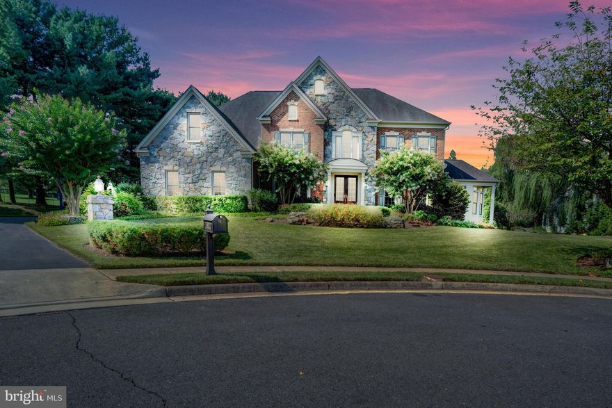 Incredible opportunity to own this beauty in the Winchester Homes built community of Oak Hill Reserve in Fairfax. Located on a secluded cul-de-sac on a builder's acre lot. This 3-car side-load garage home features 4 large bedrooms, 3.5 baths. Expanded Randall model with multiple bump-outs on all three levels. Brick and stone facade, Brick on 3 sides. Huge marble floor, 2-story foyer with circular stairs and wrought iron handrails. Hardwoods throughout main floor. New carpet upper floor. Bright sunroom and large office conveniently located right next to the living room and lead to the large, 2-story family room with walls of windows, gas fireplace with stone mantle and an additional set of stairs to the bedroom floor. Huge kitchen with upgraded stainless steel appliances, granite counters, island, breakfast area. Formal dining room with bay window and butler pantry. The upper floor boasts a huge primary bedroom with tray ceiling and a gas fireplace. Huge walk-in closet. A dressing area with make-up vanity leads to the newly remodeled bathroom with separate soaking tub and shower.  Three other large bedrooms complete the upper floor.  Guest room with its own bath, two other bedrooms share a jack-and-jill bath, all with granite vanities.  Note the size of these bedrooms are larger than the typical floor plan due to the bump-out options. 3-zoned, efficient heating, A/C provides comfortable living. Huge unfinished lower level with with walk-out/up provides additional space for expansion. Wrough-in plumbing for additional bath. Nice community close to Fair Oaks Mall,  Fair Lakes, easy access to Fairfax County Parkway, I-66, Rt 50. Please take off shoes or use shoe booties provided in the foyer.