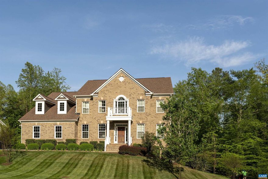 This Whittington custom home offers a bright and airy kitchen, showcasing white cabinetry w/ pull-out wooden shelves, Quartz countertops,� oversized island, spacious walk-in pantry with custom shelving, Stainless steel appliances, a built-in wine cooler, and a charming butler?s pantry/bar with wood countertops. The kitchen seamlessly flows into the family room where one can step out onto a large deck that overlooks one of the most desirable lots in the neighborhood. The flat, fenced-in backyard, surrounded by serene woods for added privacy, boasts an underground sprinkler system. Upstairs, you?ll find 4 spacious bedrooms and 3 full bathrooms, including the primary suite. The primary bedroom features a  sitting area, an expansive spa-like bathroom w/ upgraded marble tile, and a custom California closet. The  finished basement offers a dedicated home theater room, as well as room for a game area, home gym, or office. Pre-plumbed and wired for a wet bar or kitchenette, this expansive basement also includes a full bathroom, and a bedroom. Sliding doors lead to an extended stone patio for additional outdoor entertainment space.Plus, the property backs up to scenic trails, Conveniently located near downtown, UVA, Fifth Street Station.