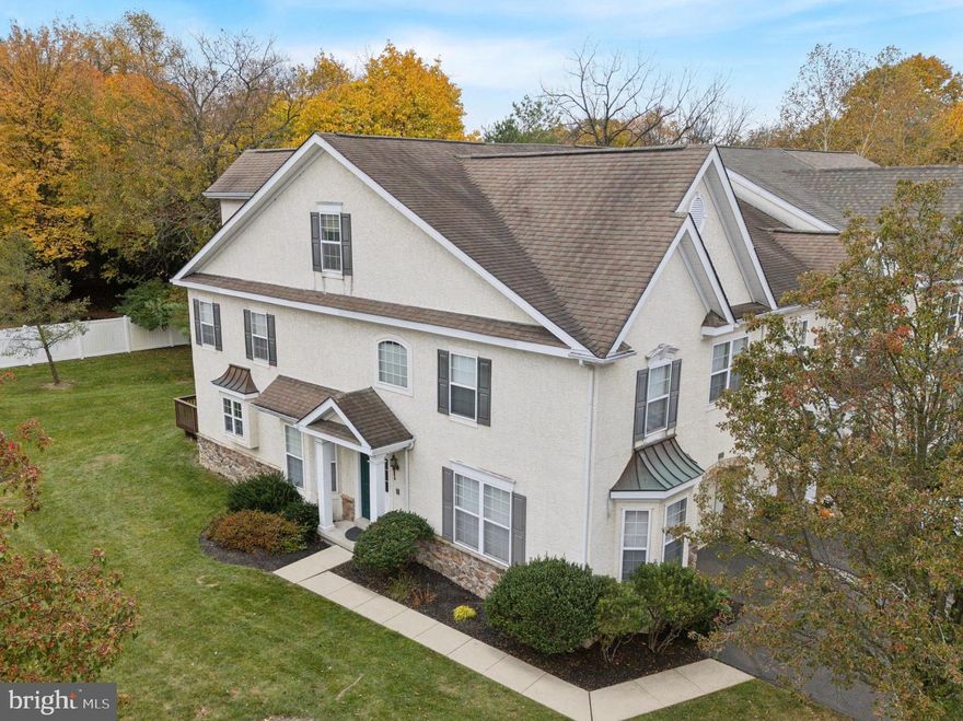 Don’t sleep on this one! The Seller is offering a 1% Buyer Credit with an acceptable offer AND special financing options are available. Lots of value to be had on this fantastic end-unit townhome that feels very much like a single home and offers privacy and flat yard space to enjoy. Hill View in Plymouth Meeting is a small enclave of homes in a fantastically convenient location that makes any commute a breeze. It’s part of the award-winning Colonial-Montco School District ranked on Niche among the top 2% of districts in the country. As a model home for the development, this property features more upgrades than most which include trim work, upgraded lighting, expanded windows and structural bump-outs. A particularly sought-after option is the finished 3rd level that provides  700sf of bright and cheery living space. The layout offers dedicated living and dining rooms and a spacious eat-in kitchen that opens to the 2-story family room. Off the kitchen is a private and peaceful south-facing deck, offering a wonderful place to enjoy morning coffee and al fresco dining. A powder room and interior access to the garage complete the first floor. On the second floor is the primary bedroom suite, two additional bedrooms, a second full hallway bath, and laundry room. The primary bedroom has great views, lots of closet space, and a large bathroom featuring a corner soaking tub, separate oversized shower, and a double vanity sink with new faucets. The third floor is currently used as an extra family room and office. Others have used this space for a fourth bedroom, a playroom, exercise or art studio. Under all this great living space is an expansive lower level that provides tons of extra storage. This is a home that can grow with you for years to come, and it is also a home that can allow you to downsize without sacrificing your comfort. The interior has been freshly painted in a neutral color palette, hardwood floors refinished, carpets cleaned and is ready for you to move right in. More notable features include new sliding glass doors, updated HVAC, newer toilets, new faucets, an intercom and security system, an oversized garage with extra storage, and custom window treatments. The association includes professional maintenance for snow removal including driveways and walkways, landscaping and grass cutting, trash removal, and driveway resurfacing happening this spring. All within short drives are conveniences such as the Plymouth Meeting Mall, Target, Whole Foods, the Greater Plymouth Community Center with pools, classes, and activities for all ages. Several nearby towns offer charming shopping, restaurants, and amenities including Blue Bell, Ambler, Conshohocken and Lafayette Hill. The train to Philadelphia, Schuylkill River Trail access towards Philly or Valley Forge are all easily accessible. There is truly too much to write about this home and its fantastic location. Schedule a private showing to come see it for yourself!