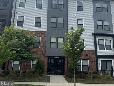 Photo of 23669 Golden Embers Square #403, ASHBURN, VA 20148 (MLS # VALO2129836)