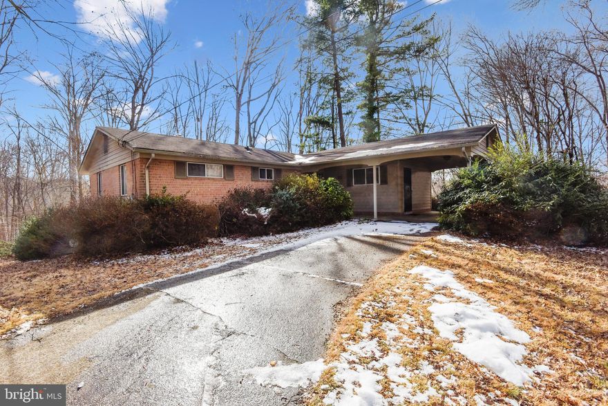 Located in a beautiful neighborhood that backs up to Pohick Creek Valley Park, this two-story rambler is waiting for you to add your personal style and design ideas to make it the home of your dreams. This rambler style home with a carport, at the end of a cul-de-sac has three bedrooms, two full baths and a full basement that leads to beautiful unobstructed views of Pohick Creek Valley Park. Built in 1967, the home boasts a refined character throughout. The main level living area has hardwood floors which extends throughout the bedrooms. The living room has a large picture window, leading to an expansive deck to enjoy the sounds and views of nature. The lower level recreation room is the perfect spot to entertain friends and family. With the desirable close-in West Springfield location and easily accessible to the major interstates, this property is perfect to build the home of your dreams.