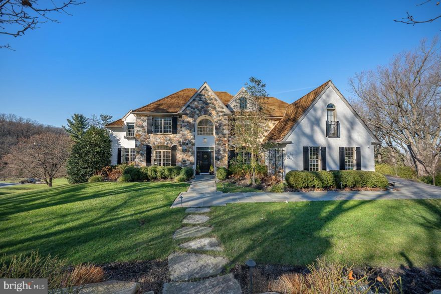 Welcome to this exquisitely renovated home in the sought-after Avonwood neighborhood of Wayne, Tredyffrin Township! The 6 bedroom, 4 full, 2 half bath home offers over 6,500+ square feet of total living space with an expansive finished basement and egress to side yard, and heated path to the fenced in hot tub and pool area.  This house has the most refined features with its premium finishes, including exquisite millwork throughout, double crown molding, beautiful new random length, hardwood floors, new solid paneled wood doors and glass antique styled hardware, new and high-end light fixtures inside and out, tall ceilings, top of the line gourmet kitchen with new appliances and custom cabinetry that opens to the cathedral ceiling family room and breakfast room, all new custom bathrooms, and much more. Enter a gracious, two-story front hall with a transverse staircase leading to the second floor. To the right of the front door is a cozy den/office with glassed French doors and custom office built-ins.  To the left is the family Billiard room, formal dining area, and living room, surrounded by large, sun-filled windows and a French door to the outside living area, providing incredible views from every angle. Straight ahead is a formal powder room, access door to the basement, and a stunning, completely renovated gourmet kitchen featuring a bar area, coffee nook, 6 burner gas stove with griddle, double oven, expansive marble and butcher block island with seating for 5+, farm sink, designer hood, and custom cabinets. The kitchen is open to the glass surround, eat-in dining area, and cathedral-ceiling family room with a gas-burning fireplace and custom millwork from floor to ceiling.  Enjoy the wall of windows and multiple glass doors with access to the private outdoor dining and copper standing seamed roof pavilion that covers the living area with wood burning, stone surround fireplace, overlooking the lap pool and breathtaking sunset views for miles.  Back stairs to the second floor, a built-in cubby mudroom with radiant heat, and a desk area complete the first floor.  The spacious main ensuite includes a large walk-in closet, a Juliet balcony, a spa-like bathroom with a whirlpool tub, an oversized shower with double shower heads, and two marble vanities. Two other bedrooms with California closets share a hall, tub/shower combo bathroom with double vanity.  At the end of the hall, and the top of the back steps, is laundry, a small balcony overlooking the first-floor family room, stairs to 3rd floor, and an en suite bedroom with a sitting area and a Juliete Balcony. The 3rd floor is currently home to a bedroom but can also be a wonderful space for kids to hang out, a “mancave,” or an office.  There is ample storage and built-in shelving as well.  The basement is equipped with tall ceilings, an at-home gym room, game room, TV area with gas fireplace, sauna, powder room, kitchenette, a second laundry room, an additional en suite bedroom, and mud room access to an outside yard, hot tub, and pool area.  The attached, oversized, 3-car garage is heated, holds multiple built-in cabinets for organized storage, and has a utility sink, refrigerator, and temperature-adjustable wine fridge. The outside is well-landscaped with lighting, an irrigation system, a new circular driveway, and flagstone walkways. The two-level, fenced-in, outside flagstone terrace by the fireplace, pool, or hot tub is perfect for entertaining and relaxing.  Enjoy the home's manicured yard and 1 acre + of green space that serves as the neighborhood hang-out for sledding, games, and much more. The neighborhood is bustling with activities and just steps from New Eagle Elementary, one of the best elementary schools in the area. A short ride to trails at Valley Forge Park, shopping and fine dining at the King of Prussia Mall, Wayne, and Berwyn, and close to all state roads, public transportation, and the best public and private schools in the country.  A must see!
