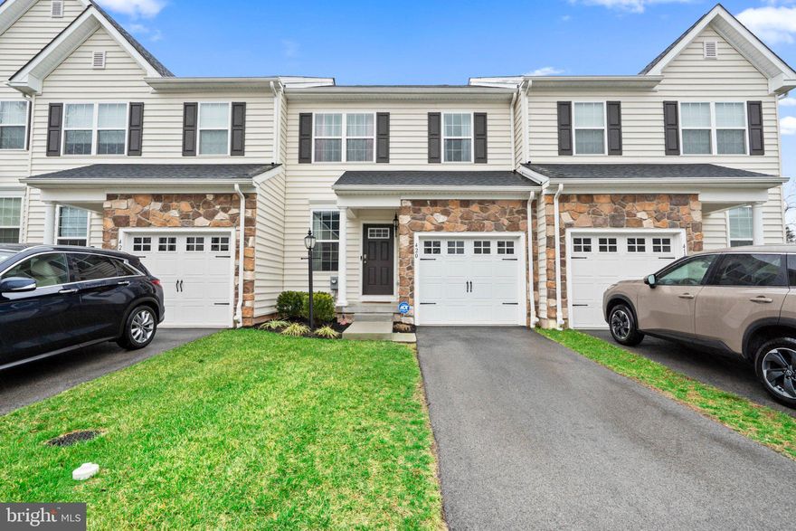 Like-new 3-bedroom, 2.5-bath townhome blending modern design, comfortable living, and a private setting within one of Montgomery County’s most convenient locations. Built in 2023, this home delivers the clean contemporary style buyers want with bright open spaces and a layout designed for both everyday living and effortless entertaining.

The main living level is filled with natural light and features wide-plank flooring, recessed lighting, and seamless flow between the living room, dining area, and stunning kitchen. Anchored by an oversized island with seating, the kitchen offers crisp white cabinetry, modern finishes, and the kind of open gathering space that naturally becomes the center of the home.

Upstairs, the spacious primary suite feels like a true retreat with a double vanity, glass-enclosed shower, and generous closet space. Two additional bedrooms and another full bath provide flexibility for guests, a home office space, or everyday living.

Step outside to an entertainer-friendly deck overlooking a more private rear setting, creating the perfect space to relax, unwind, or host friends on warm evenings. Additional highlights include an attached garage, neutral designer finishes throughout, and true like-new condition from top to bottom.

Located directly across from Norristown Farm Park and the Norristown Dog Park, outdoor recreation and walking trails are just moments away. Conveniently located near Route 422, Germantown Pike, King of Prussia, Plymouth Meeting, shopping, dining, parks, and everyday amenities, all within the Methacton School District.