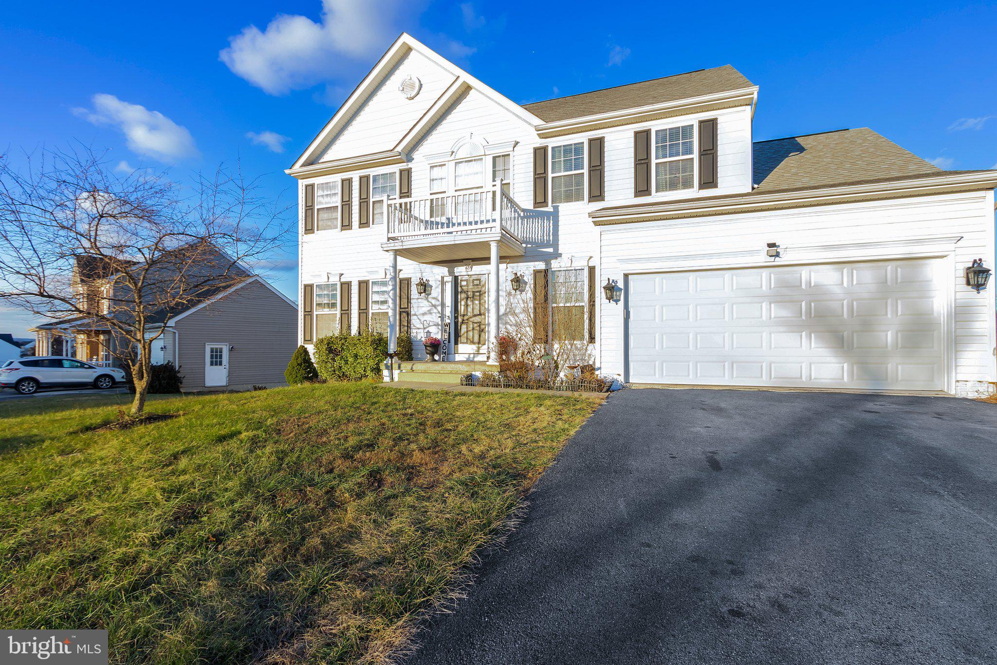 Nestled within the esteemed Stonebridge Golf Course community in Martinsburg, WV, this exquisite four-bedroom, two-and-a half bath residence offers a blend of comfort and elegance. The neighborhood boasts an array of amenities, including a sparkling community pool, a tennis court, a basketball area, and a playground with walking path, perfect for leisure and recreation. The home features a generous fenced-in backyard, providing a private oasis for outdoor gatherings and relaxation. An oversized two-car garage and ample storage space in the basement ensures convenience and organization. The inviting living room is enhanced by a cozy fireplace, while the sunroom offers a serene retreat that opens up to a charming deck.
Discover the perfect setting for the New Year in this splendid home, where luxury and community intertwine beautifully.