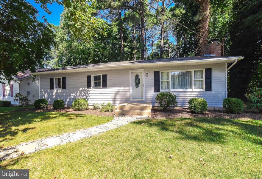 Mr. Clean is leaving so you can move right in to this completely updated Rambler w/ 3 bdrms. Gorgeous maple cabinets w/new SS appliances and lots of counter space. Spend cool nights in front of the fire. Easy care laminate floors and fresh paint throughout. Spacious private yard with cute shed for storage or studio. Enjoy community access to beach, Bay and boating on private lake. Won't last long!