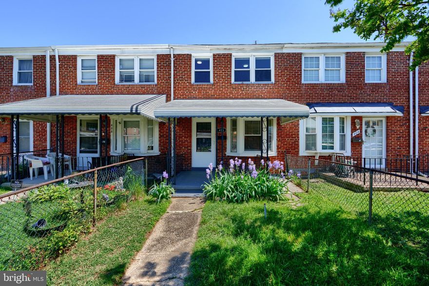 Step into this beautifully updated 3-bedroom, 1.5-bath home in the desirable Middlesex Neighborhood. As you enter, you're welcomed by a large bay window, all-new luxury vinyl plank (LVP) flooring, fresh paint throughout and well-defined living and dining areas. To the rear is an all-new kitchen with modern white cabinetry, quartz countertops, stainless steel appliances and fixtures. Upstairs, you'll find three comfortable bedrooms with new carpeting, upgraded lighting, and generous closet space. The full bath has been refreshed with a tiled surround, updated lighting, and modern fixtures. The finished basement offers a well lit area with new recessed lighting, all-new carpeting, a trendy black-sprayed ceiling, a laundry area with utility sink, and a convenient half bath. Outside of the home shows off a fenced in yard with covered front porch area, landscaping and private parking pad. This move-in-ready home blends classic charm with thoughtful upgrades—ideal for comfortable living and entertaining alike. Set up a showing today!