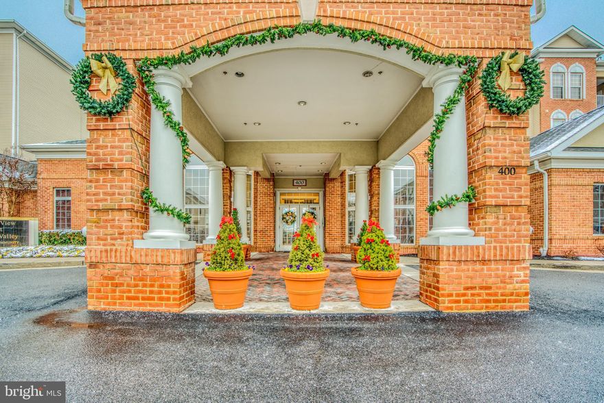 Come and  see this nice cozy unit with fresh paint and new carpets in the sought after HighView at Hunt Valley Condominium. Walk in and be greeted with a large open living area with wood burning fireplace, separate dining room with sliding door that leads to a private balcony with an amazing view of the yard and park, an upgraded kitchen with center island, laminate countertops and a separate laundry area. The spacious master suite has a beautiful archway design, a walk-in closet and a full bath. The master bath offers a dual vanity. a whirlpool tub and a separate shower. The second bedroom also has its own full bath and walk-in closet. Enjoy the amenities the condo offer such as exercise room, movie theater, rooftop tennis court and concierge.  A must see! Schedule your showing today!