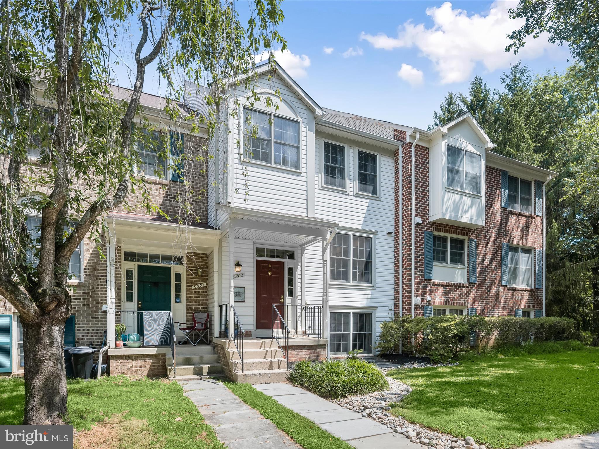 Spacious 4 bedroom townhome with a fully finished walk-out basement located in the amenity-rich Montgomery Village community. A bright, airy floor plan features living and dining rooms with a cozy fireplace and sliding door access to a deck overlooking open, tree-lined views. The chef’s kitchen is tastefully updated with white shaker cabinetry, sleek black granite countertops, custom backsplash, and stainless steel appliances. The two-level primary suite boasts a soaring vaulted ceiling, a versatile loft, walk-in closet, and private full bath. Two additional bedrooms and a second full bath complete the upper level. The walkout lower level offers a family room with fireplace, backyard access, a bedroom, full bath, and generous storage space. Enjoy a landscaped, fenced backyard backing to an open common area with serene tree-lined views. Community amenities include a swimming pool, sports courts, and tot lots. Conveniently located near major commuter routes, shopping, dining, and entertainment.