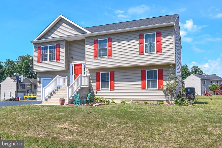 Great corner lot split foyer with 4 bedrooms and 3 full baths close to amenities.   One of the largest lots in the community,  good size out building for storage,  all for under 300k.  Don't miss out on the opportunity for all this space.