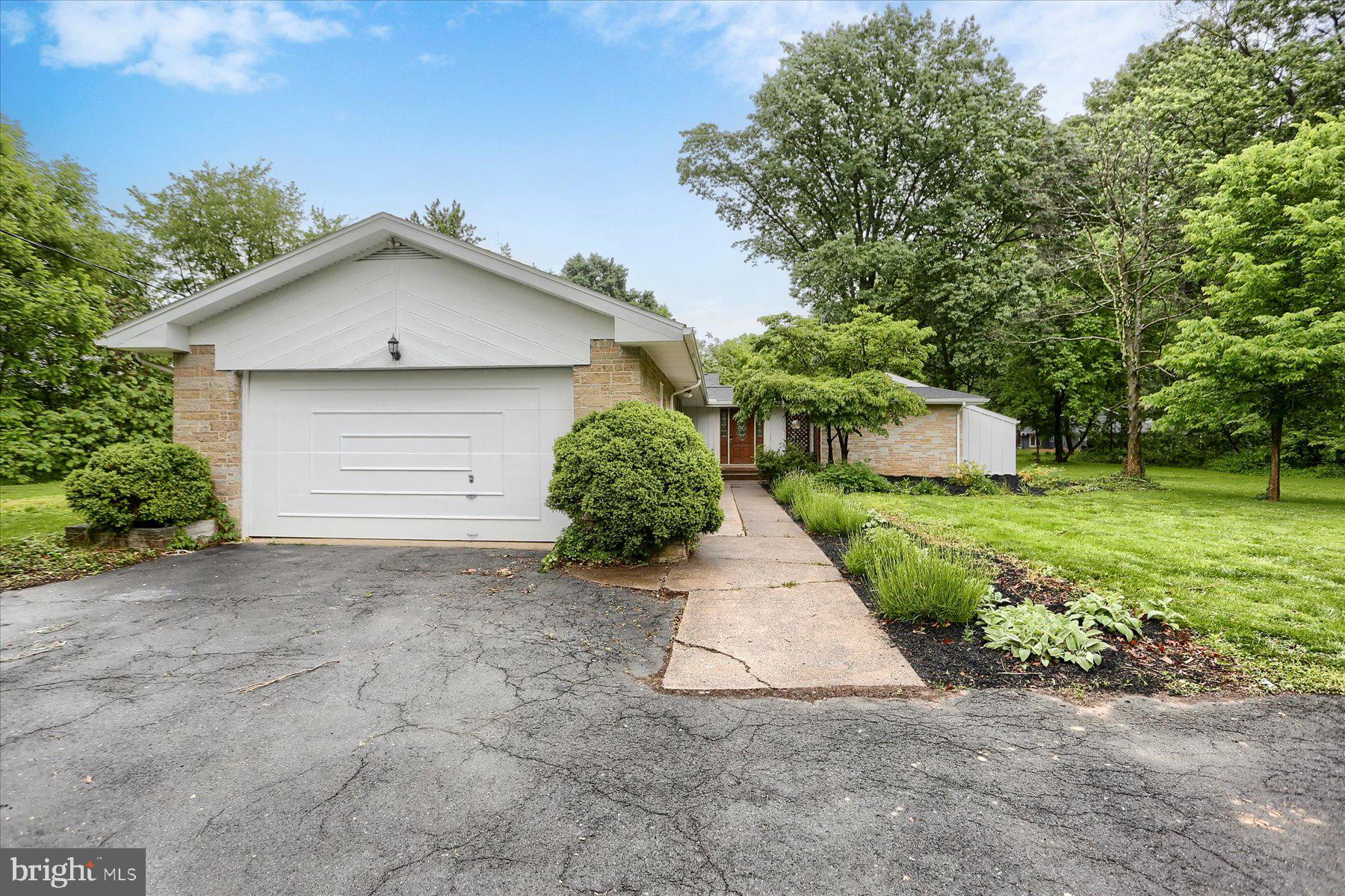 Welcome to 725 Edgewood Lane in Mechanicsburg School District. This ranch home offers approximately 2,489 square feet with 4 bedrooms and 1.5 baths on 3 ACRES! A true find in Upper Allen Township! Easy one floor living with a fantastic layout. The living room is bathed in natural light through the enormous windows. Watch the deer and other wildlife outside while staying cozy in front of the new pellet stove. The kitchen was recently remodeled with new floor, wood cabinetry with a beautiful paint finish, new back splash, and granite counter tops. It offers ample cabinetry and storage. The laundry is currently conveniently located in the kitchen with a beautiful wood top perfect for folding clothes or storage. If you would rather use that space as a breakfast bar, you can relocate the laundry back to the basement. All of the bedrooms are a great size with ample closet space. The primary suite is currently being used as an additional family room which works better for this owner but could easily be used as a large, private, bedroom again. A heated sunroom with a wall of windows on both sides is the cherry on top of this wonderful home. This is not a boring, cookie cutter home! It is filled with character including a courtyard area outside of the main bedroom. So many updates in the last few years to mention including new mini-split, brand new roof, new gutters, downspouts, and fascia, new windows, new sliding glass doors, whole house repainted in neutral color, electric heat pump, newer electric panels, new well tank and pump, remodeled bathrooms, and new LVT flooring in some areas. The owners made several changes to make this home as economical and energy efficient as possible with newer HVAC/ minisplit system, new windows and doors, and the addition of the pellet stove. The home sits down a private drive with a large, cleared area for whatever your heart desires, but still offers ample wooded areas for wildlife and privacy. Unheard of in this area! Ample parking for hosting get togethers. An oversized 2 car garage and shed for additional storage. If you need even more space, the unfinished basement offers several opportunities for additional family rooms, office, or bedrooms. It even has a fireplace! The possibilities are endless in this sprawling ranch for any new owner. Could be you! Close to a variety of major roadways, schools, shopping, amenities, and parks. A community that you can feel proud to be a part of. Washer, Dryer, Kitchen Refrigerator do not convey. Refrigerator in kitchen will be replaced with the SS fridge in the sunroom.